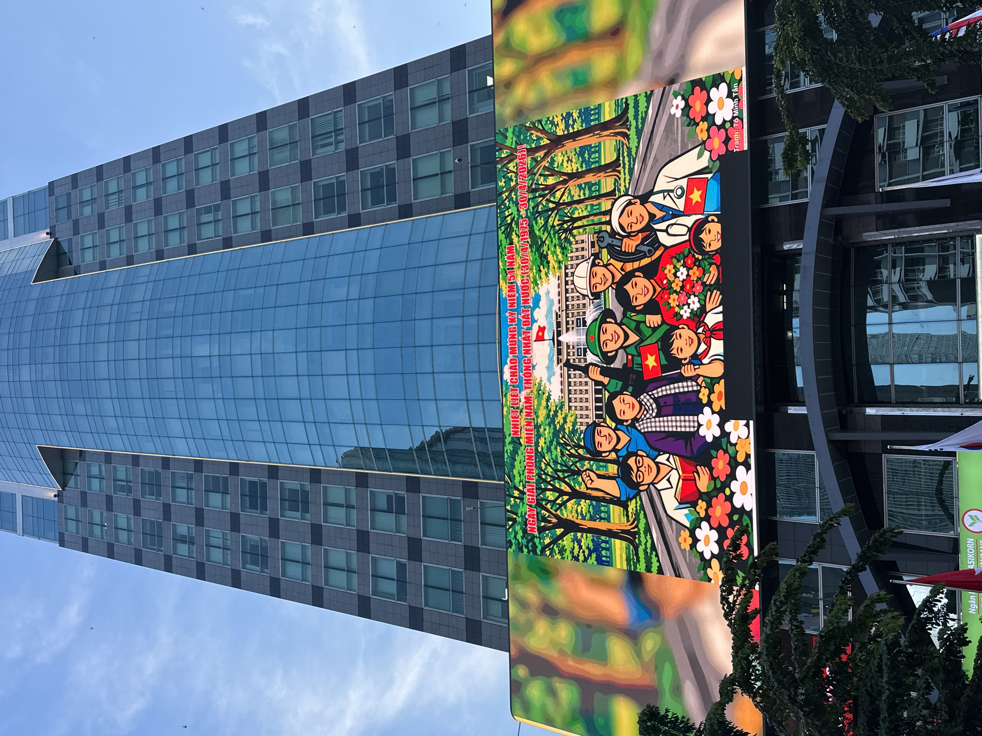 Glass building reflects sky in Thủ Đức, Vietnam