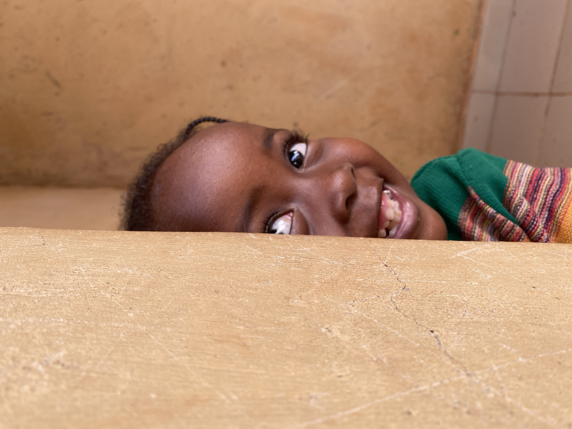 Child captured in multiple moments in Kuru Dungus, Nigeria