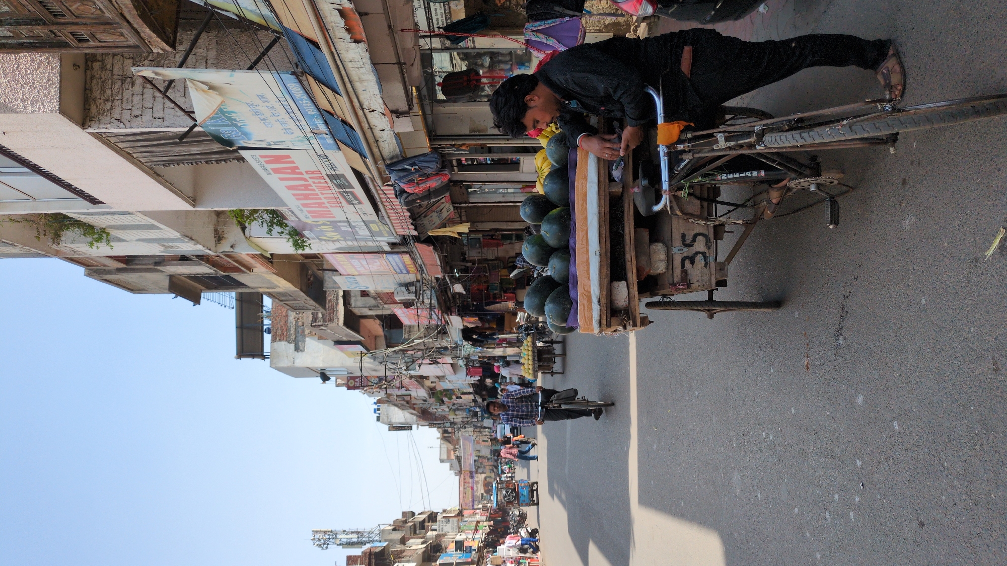 Early morning street life captured in Amritsar commercial district
