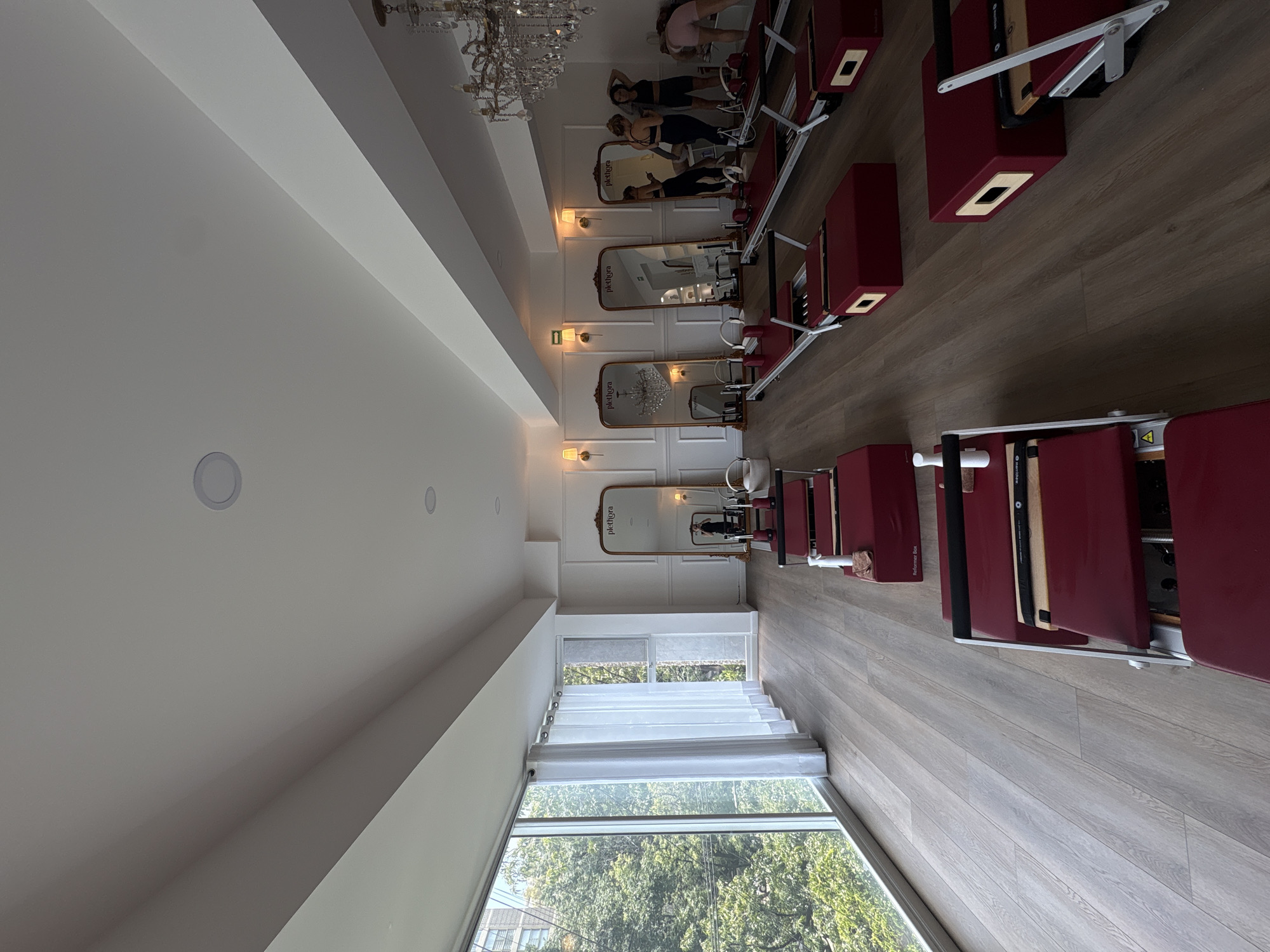 Pilates studio session in Mexico City, mirrors and reformers