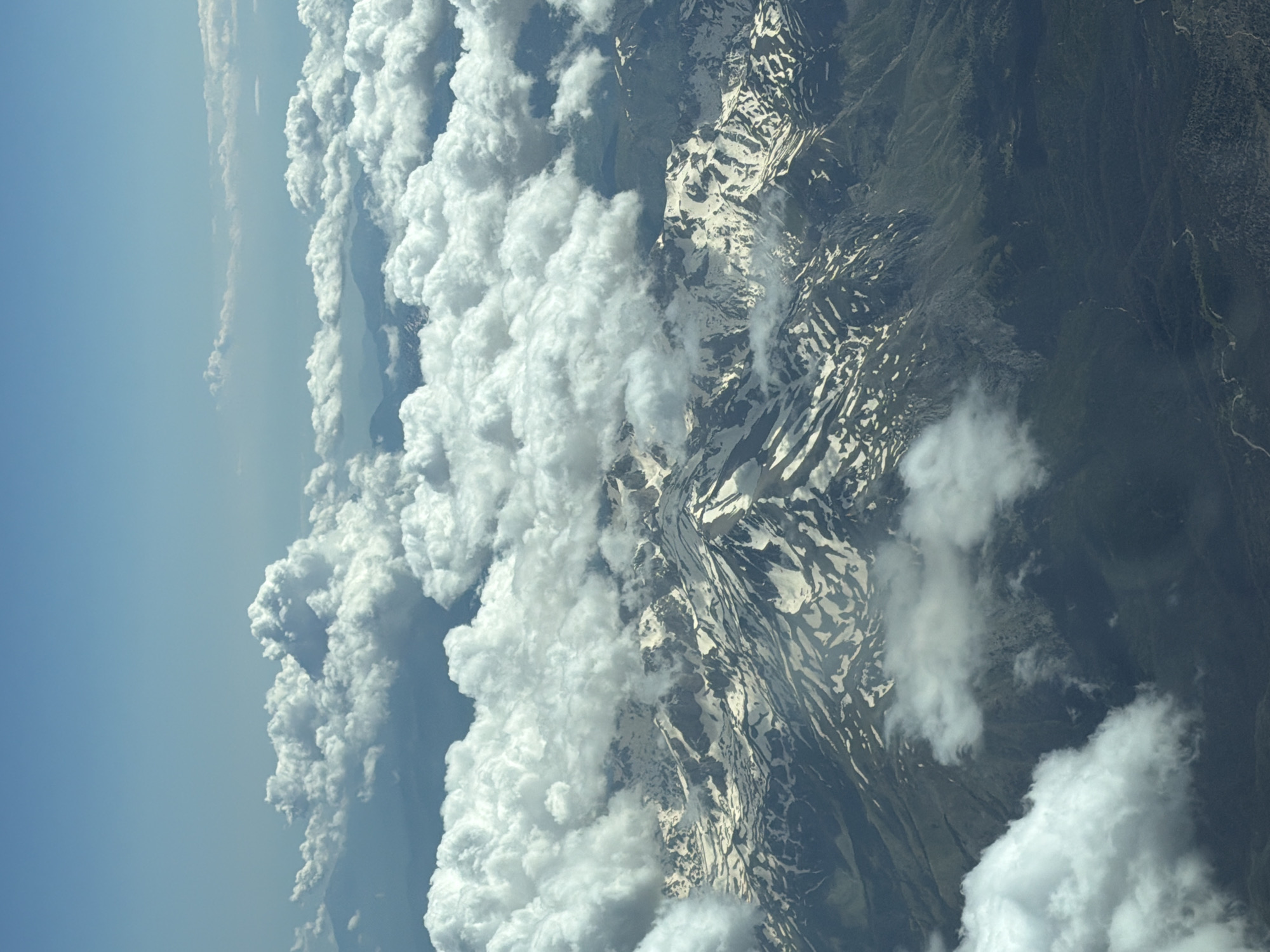Snowy mountains and clouds observed near Aksu, Turkey