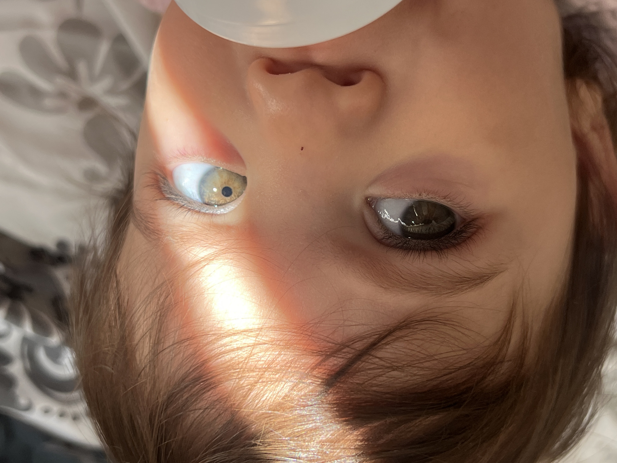 Sunny morning portraits of a baby with heterochromia, Elena, Bulgaria