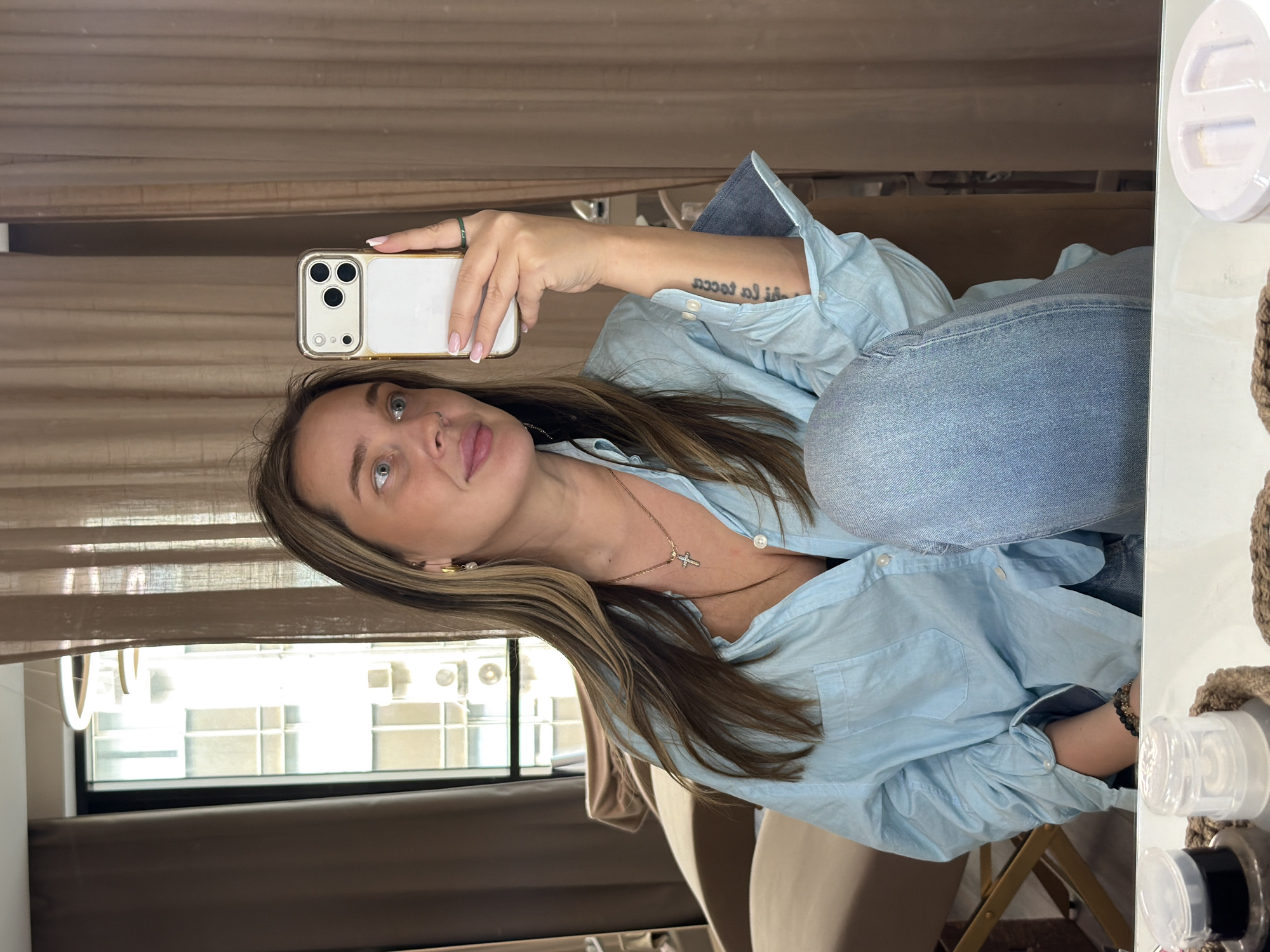 Woman takes selfie indoors in Moscow