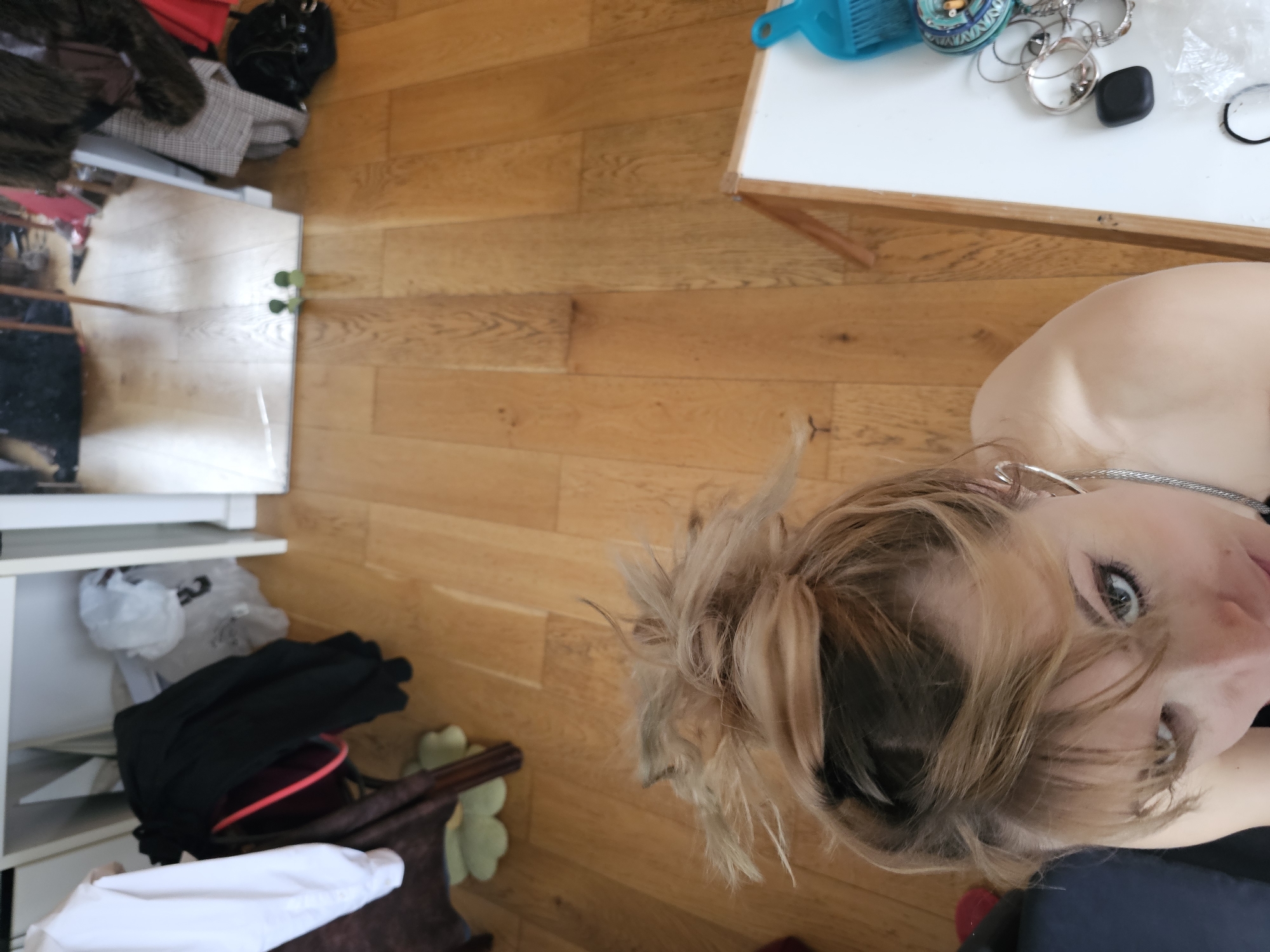 Woman photographed in early morning Pantin apartment setting