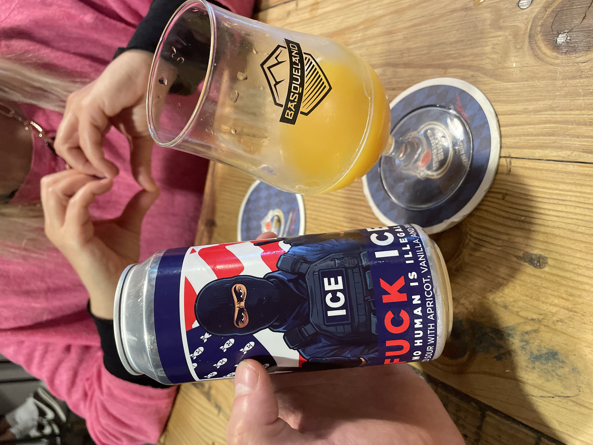 Bar scene captured in Barcelona featuring Spanish brewery branding