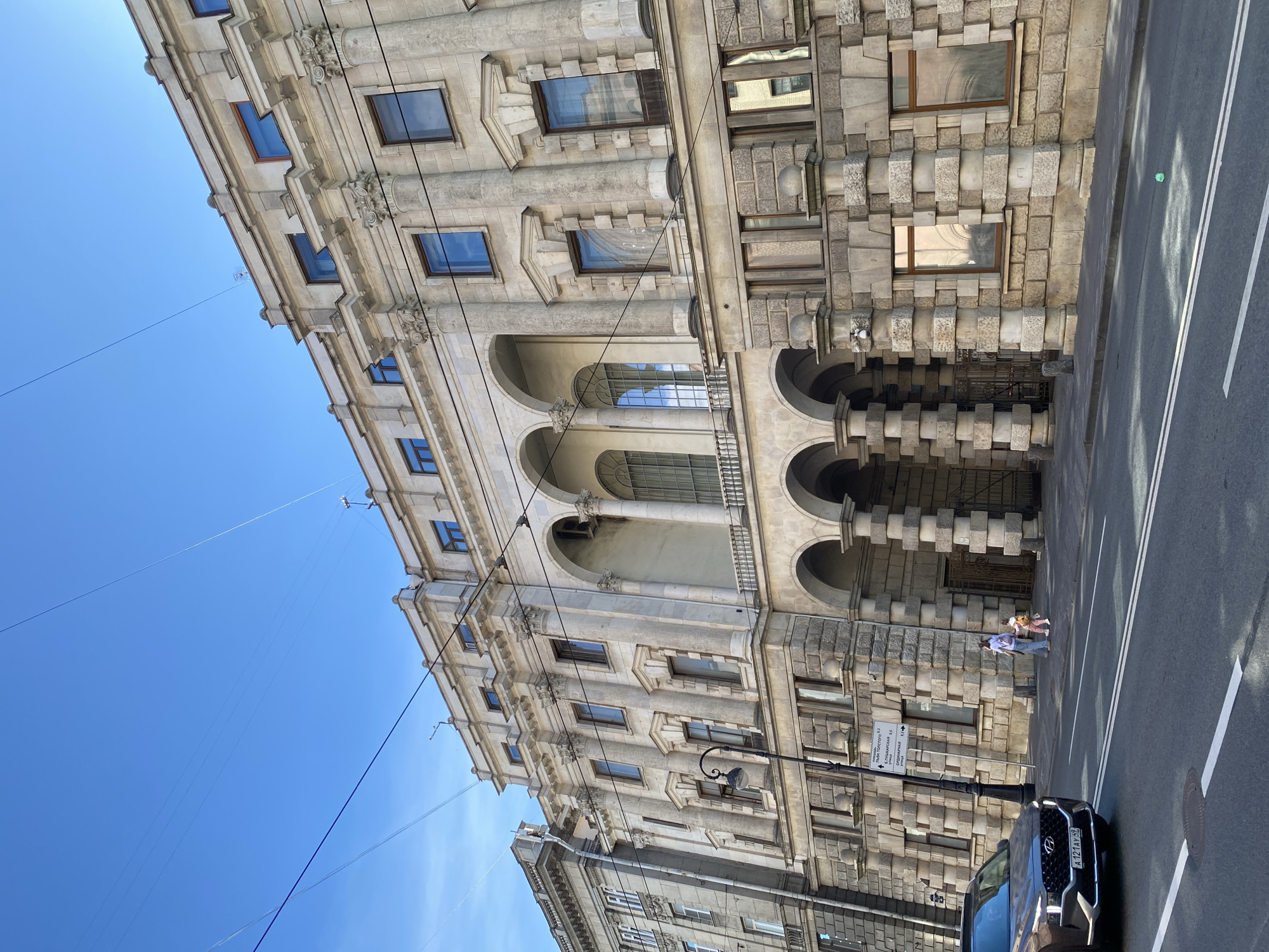 Sunny afternoon stroll captured along Saint Petersburg canal district