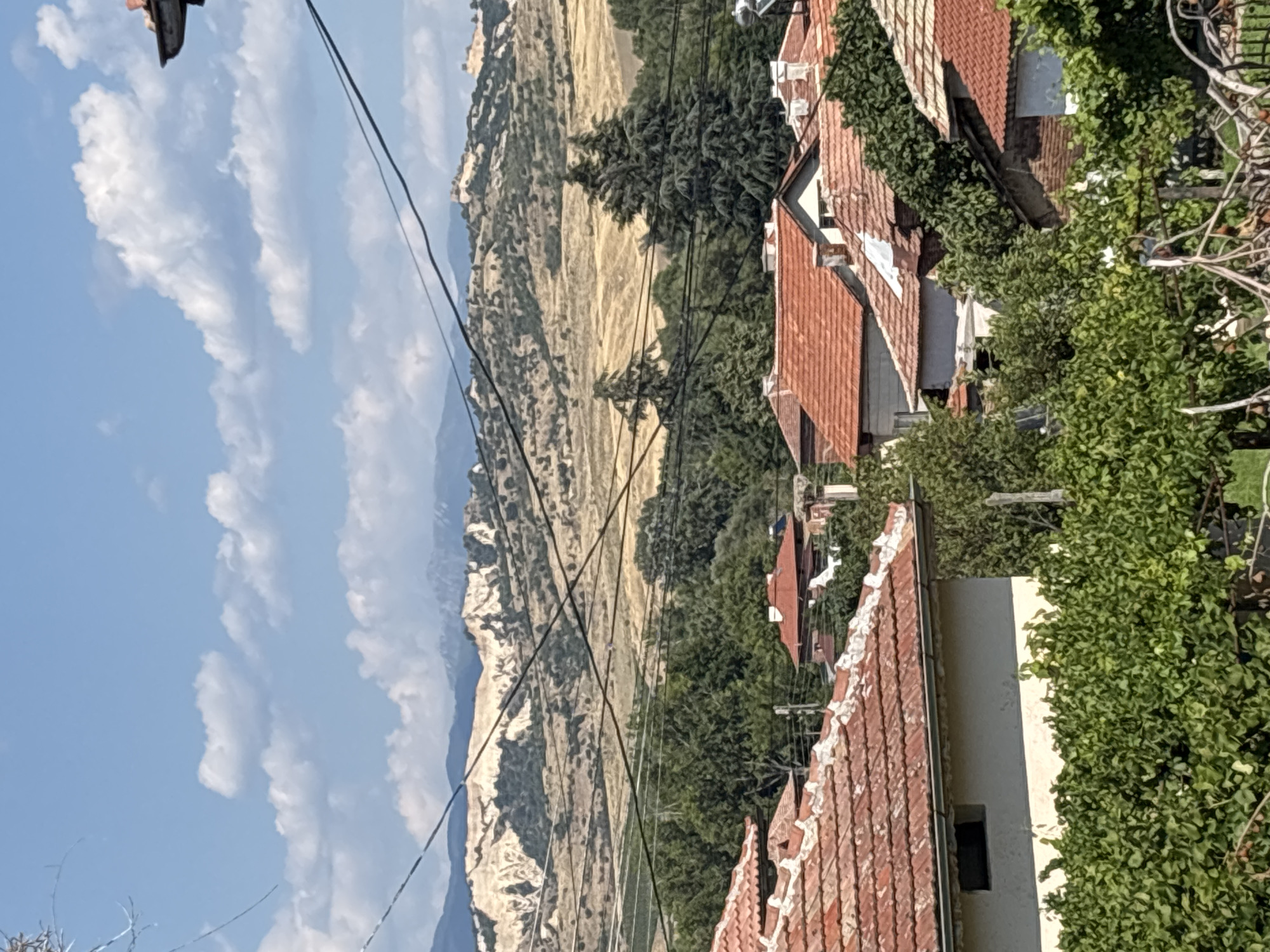 Red rooftops and a bird's nest in rural Sklave, Bulgaria