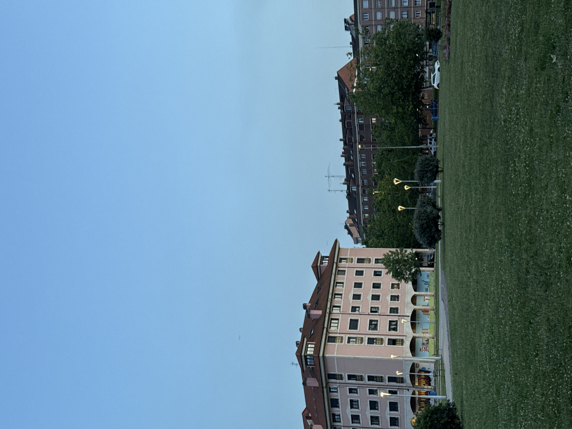 Evening stroll captures Gijón architecture and blooming roses