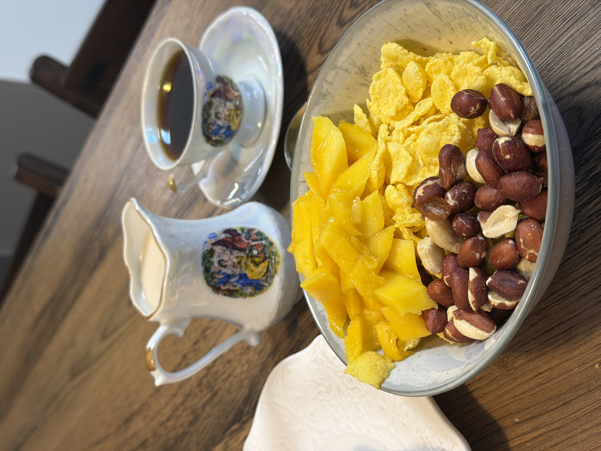 Breakfast spread with cereal, mango, and egg toast in Perm