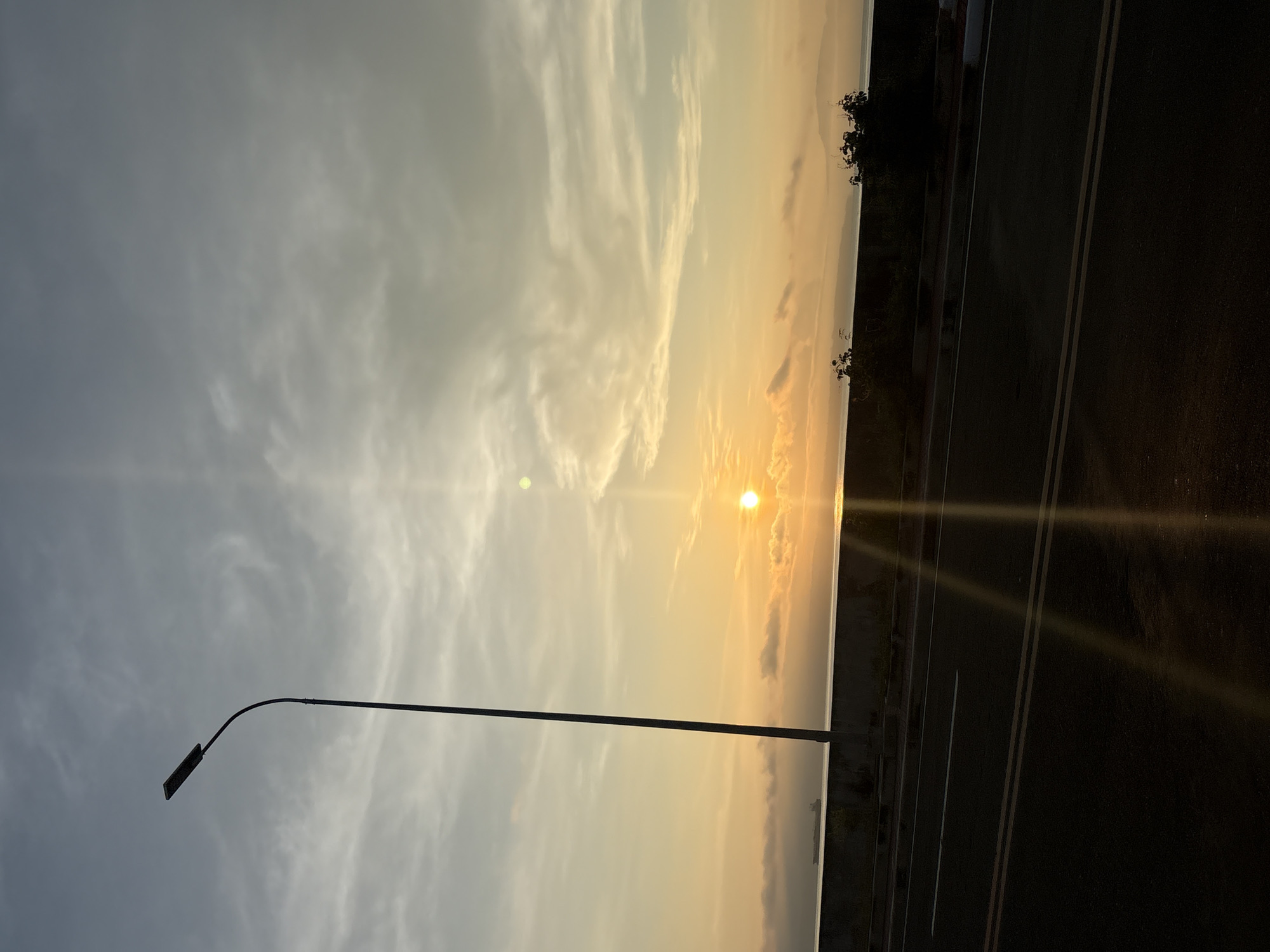 Motorcycle rider captures sunset journey through Davao City coastal roads