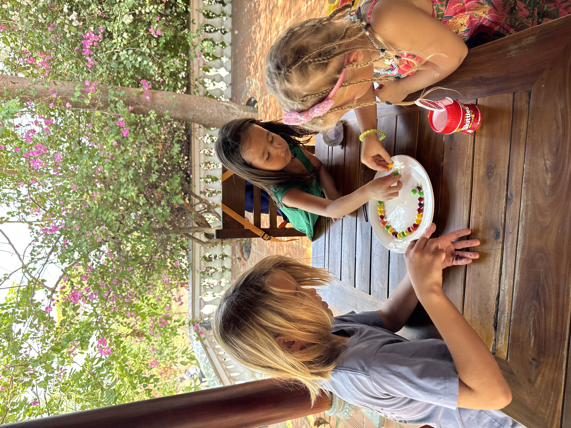 Children conduct candy science experiment in Mũi Né