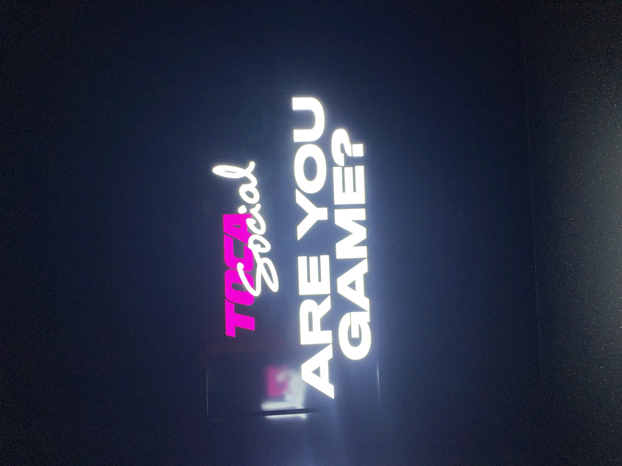 Woman plays interactive games at TOCA Social venue in London