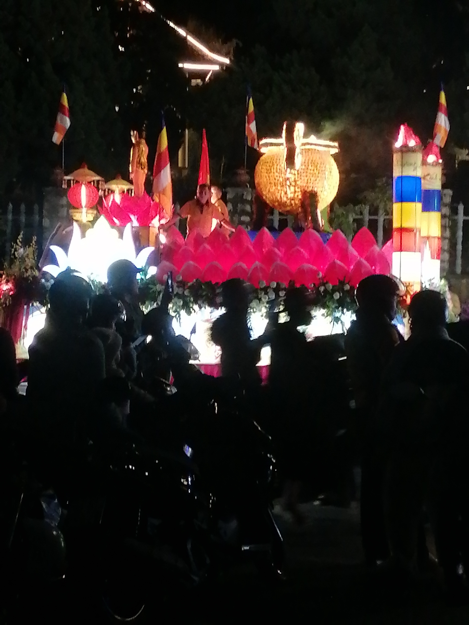 Buddhist procession with illuminated floats parades through Da Lat