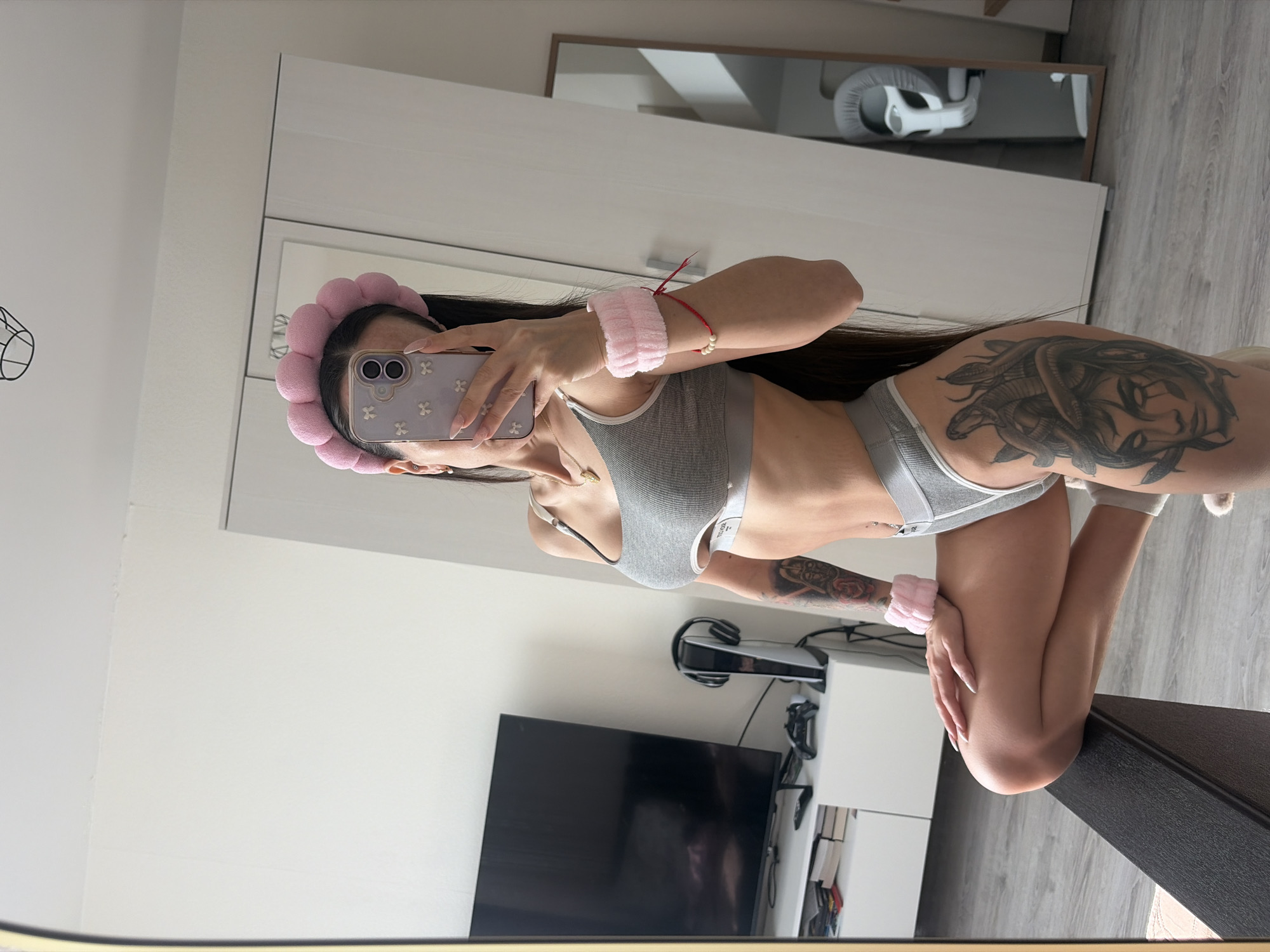 Woman takes mirror selfies in Saint Petersburg apartment