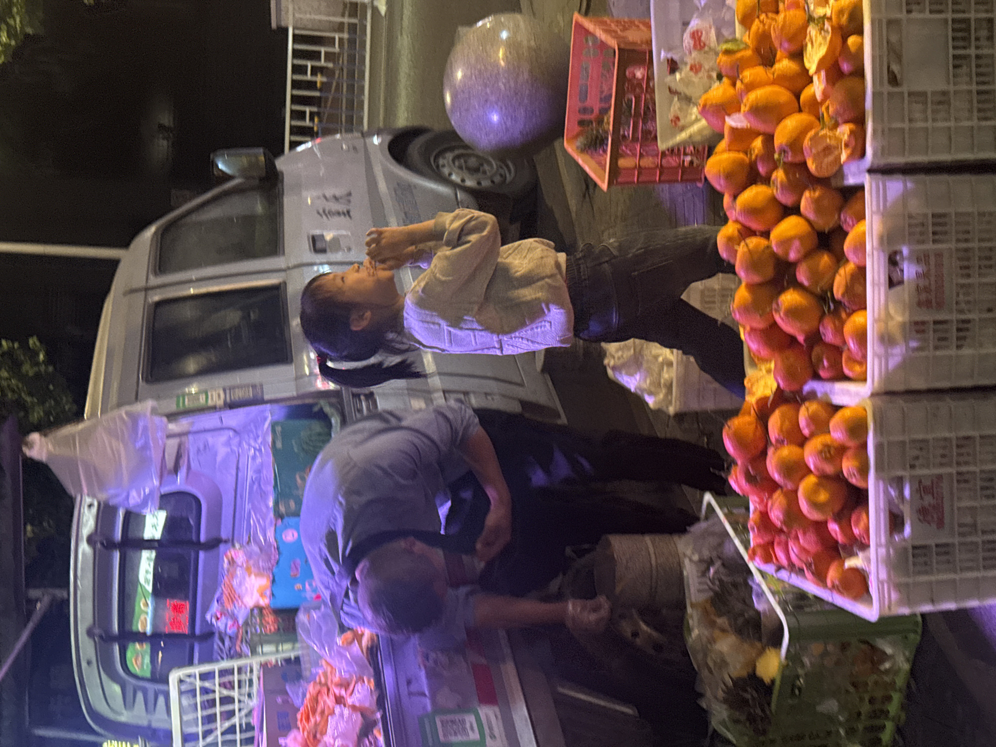 Street food vendors operate in Yuzhong District, China