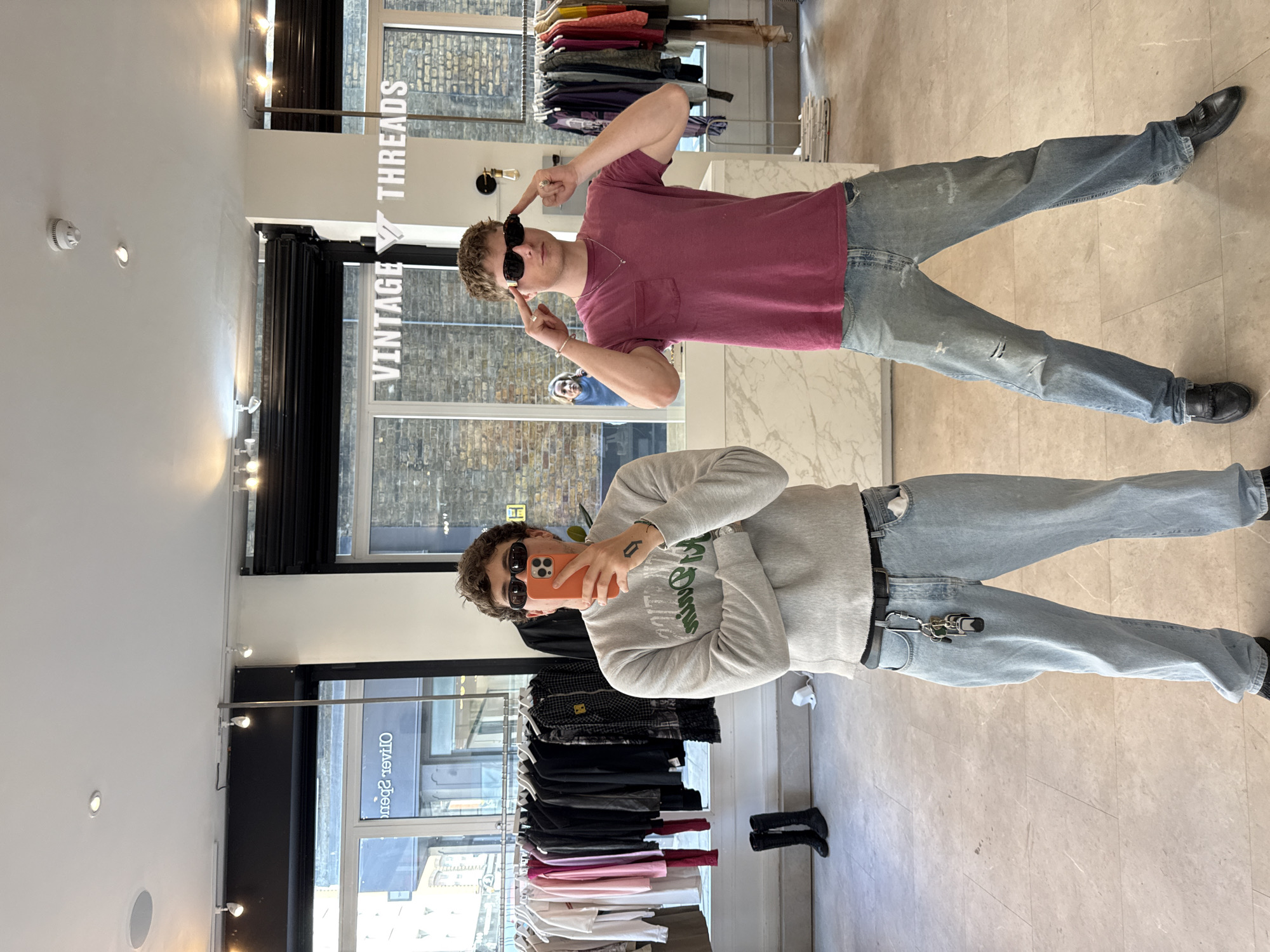 Shoppers photographed at London vintage clothing store