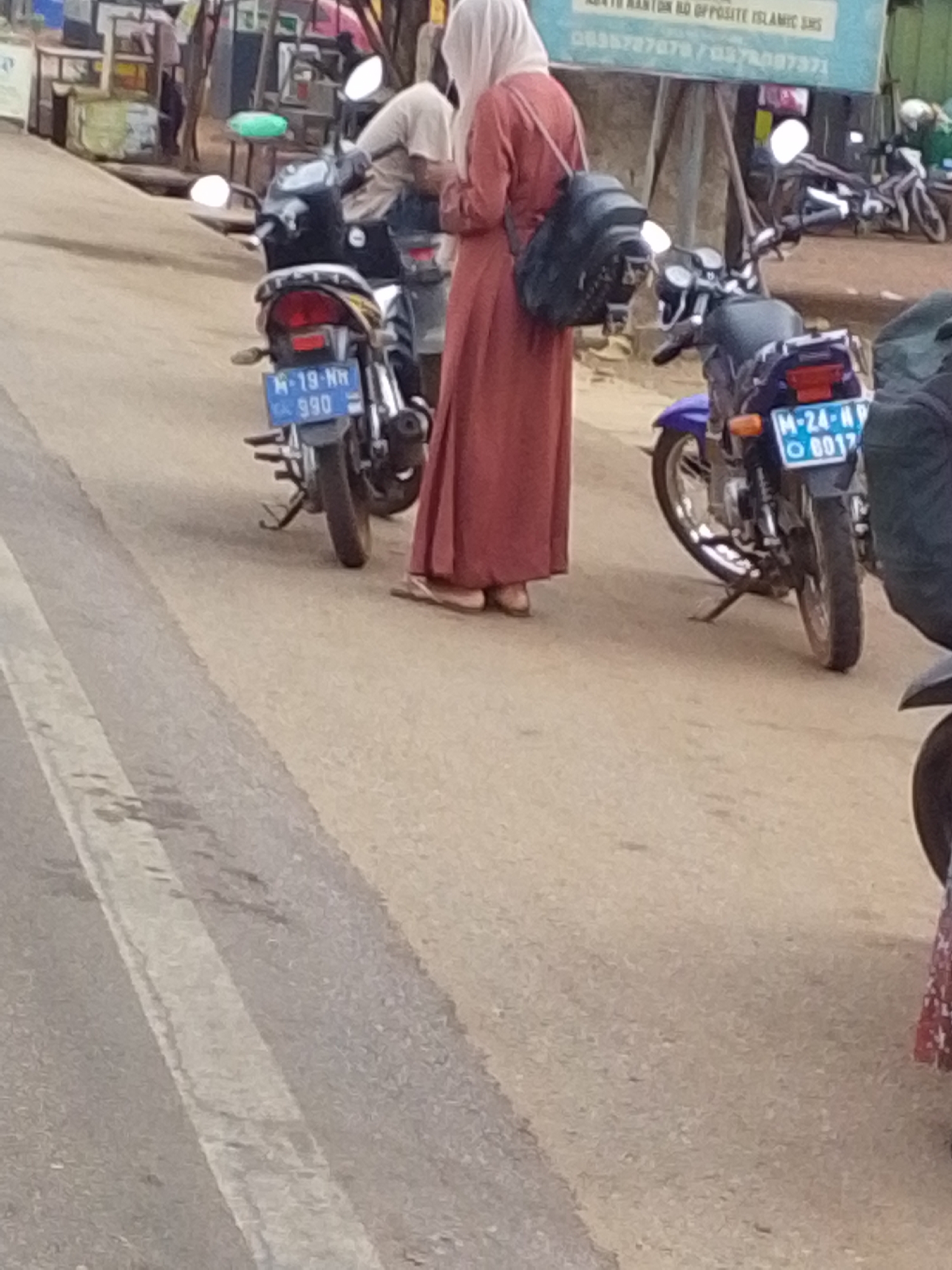 Street scene with motorbikes observed in Tamale, Ghana