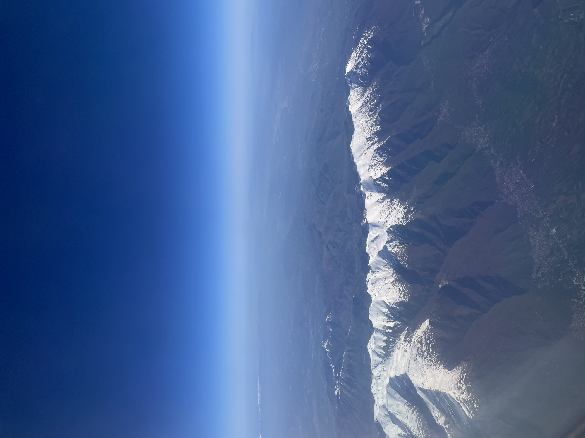 Morning aerial views capture Montenegro's snow-capped mountains and coastline