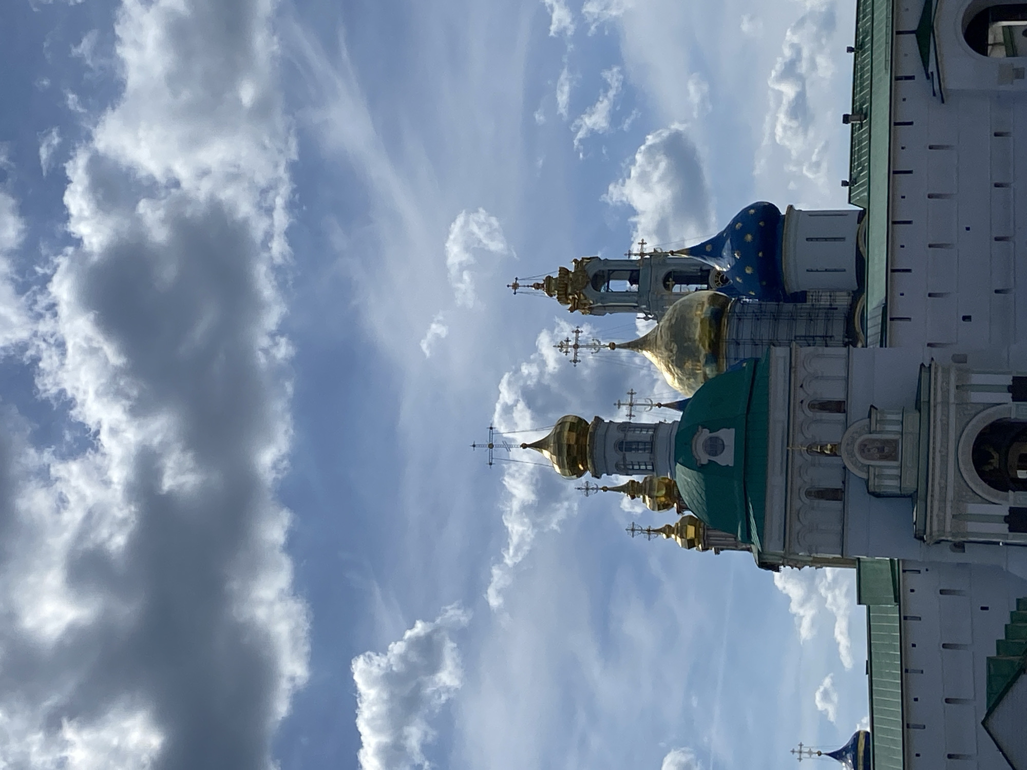 Tourist documents historic Russian monastery complex in Sergiyev Posad