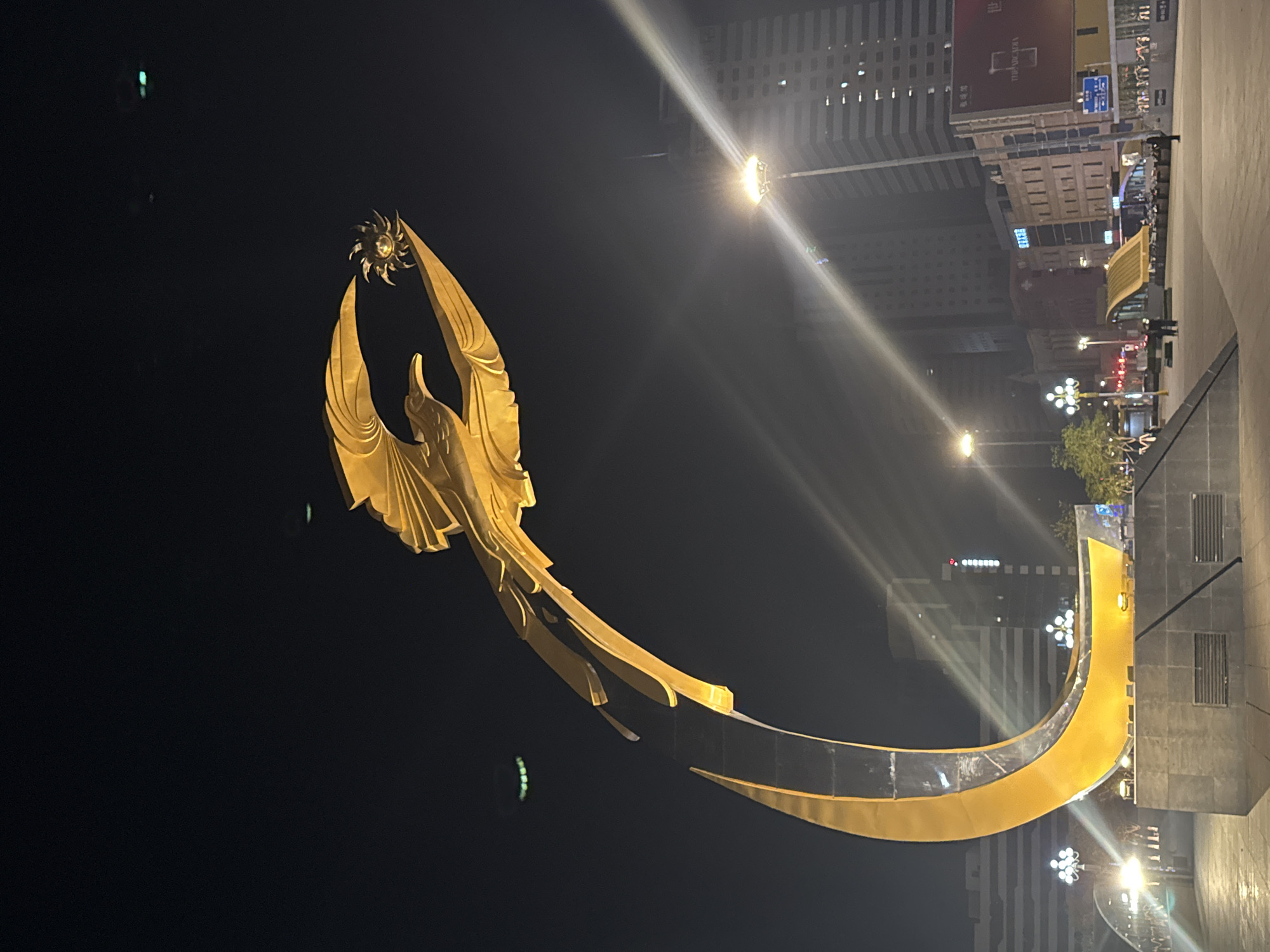 Golden bird sculpture illuminated in Shenyang's Shenhe District nightscape