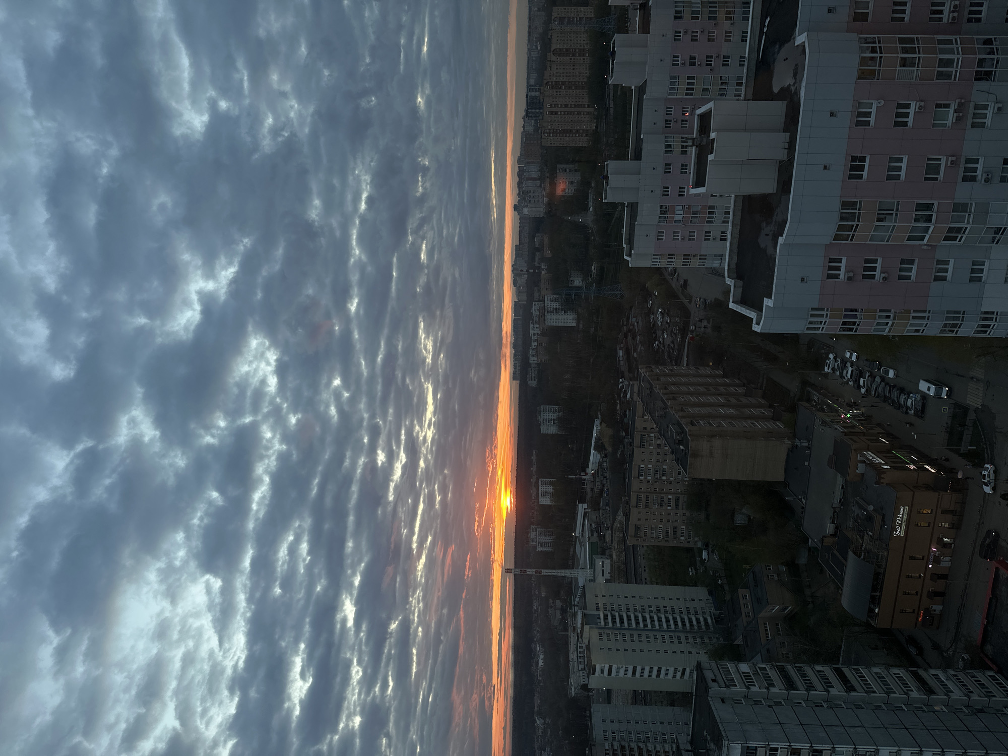 Dramatic sunset illuminates Khimki cityscape on May Day evening