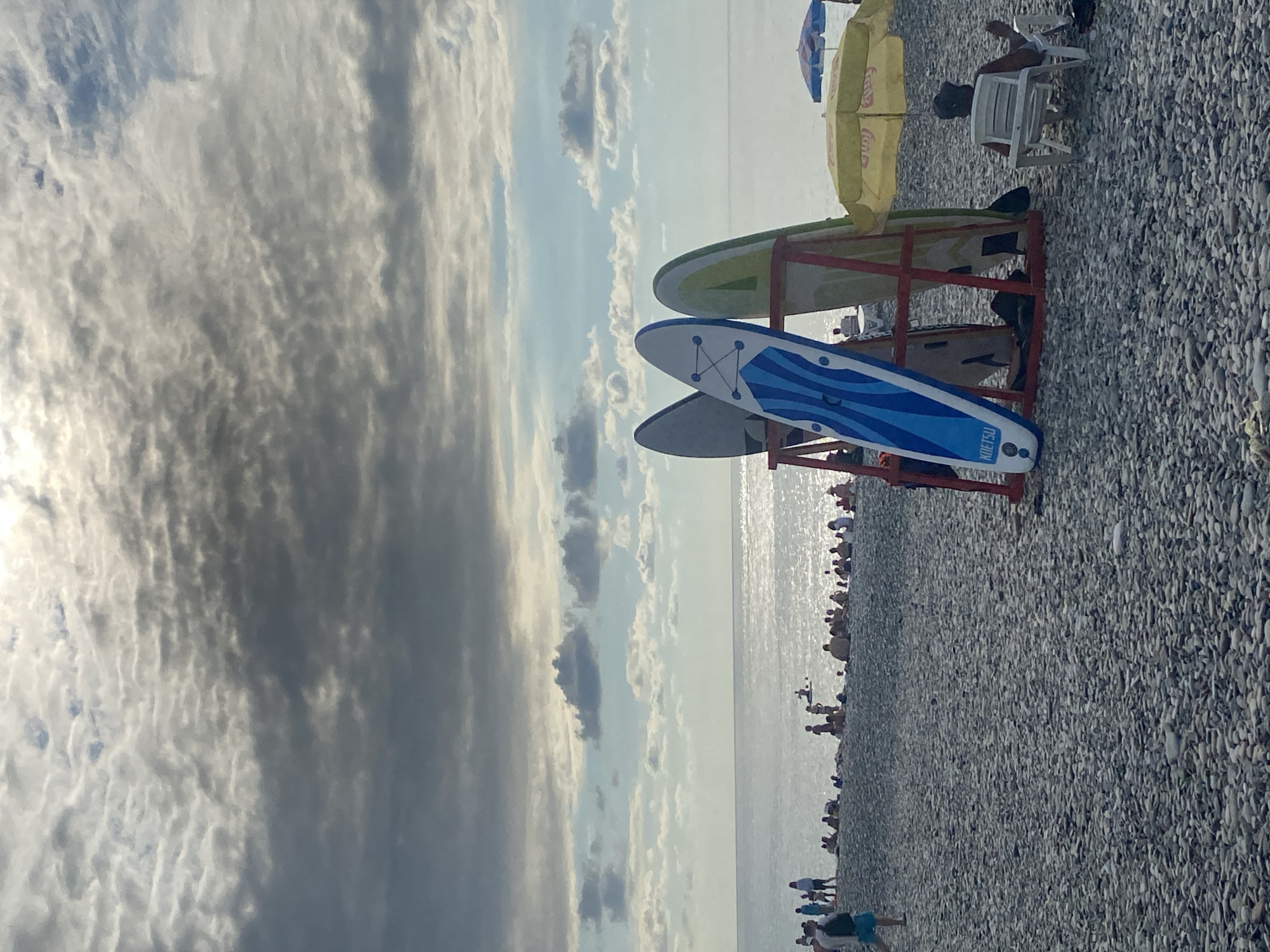 Batumi's pebble beach and rising skyline, summer 2026