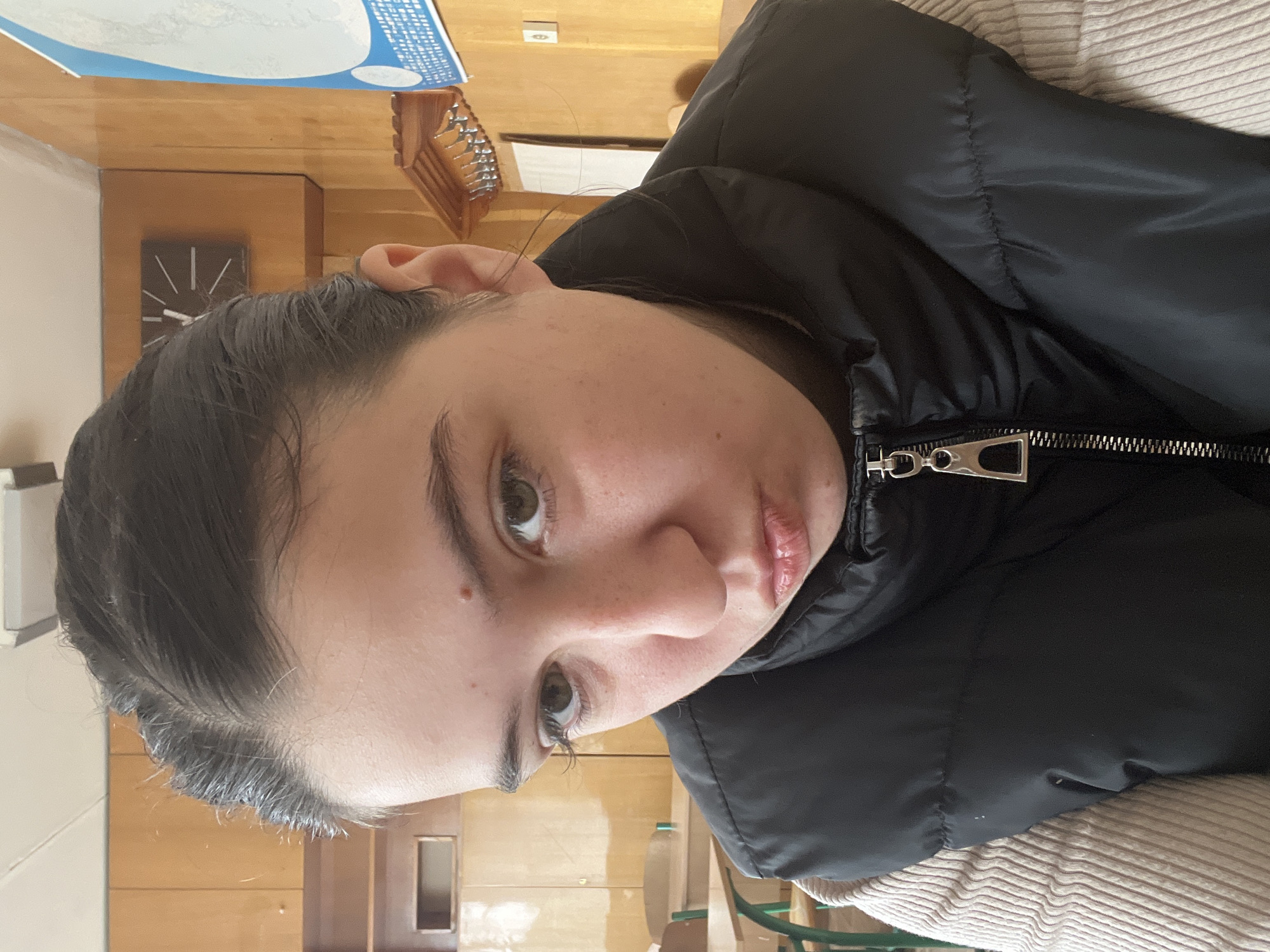Woman photographed in Ukrainian classroom during morning hours