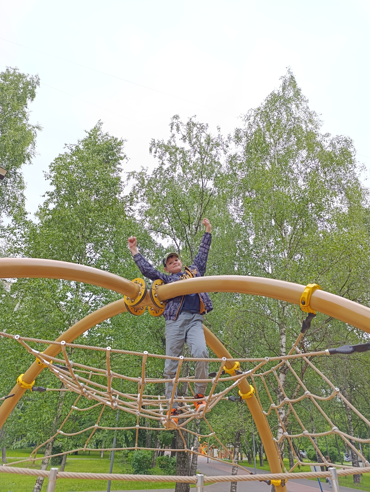 Moscow families enjoy afternoon playground activities in city park