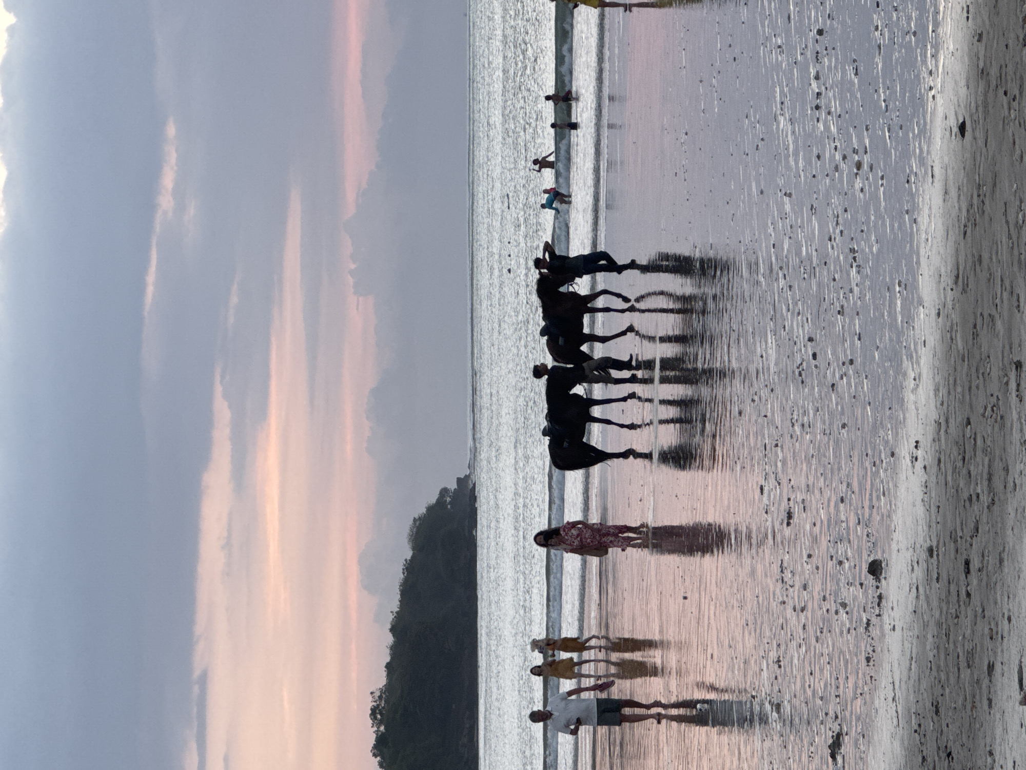 Beachside sunset dining captured in Kuta Selatan, Indonesia