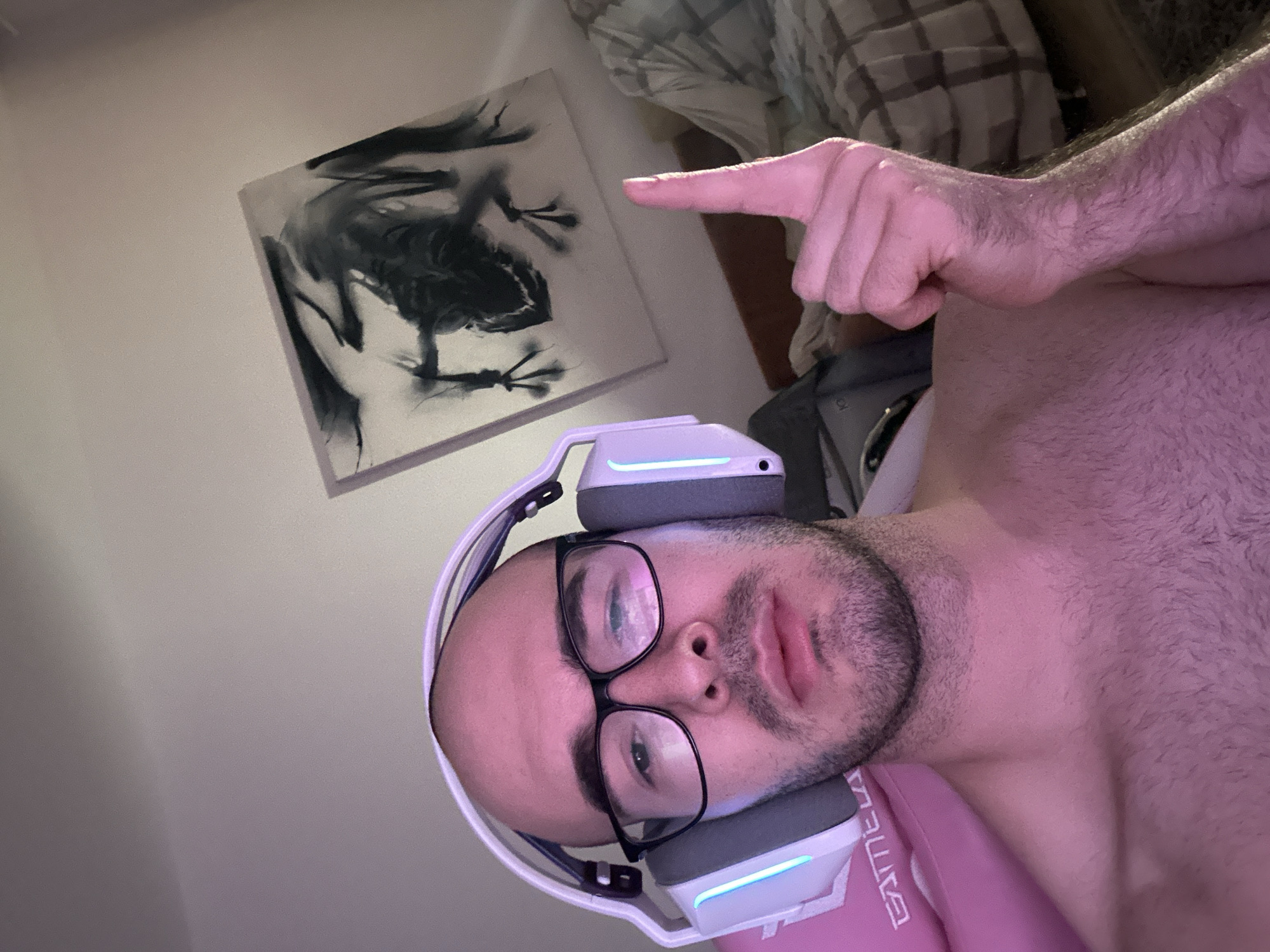 Man takes multiple selfies with gaming headset in Lyubertsy