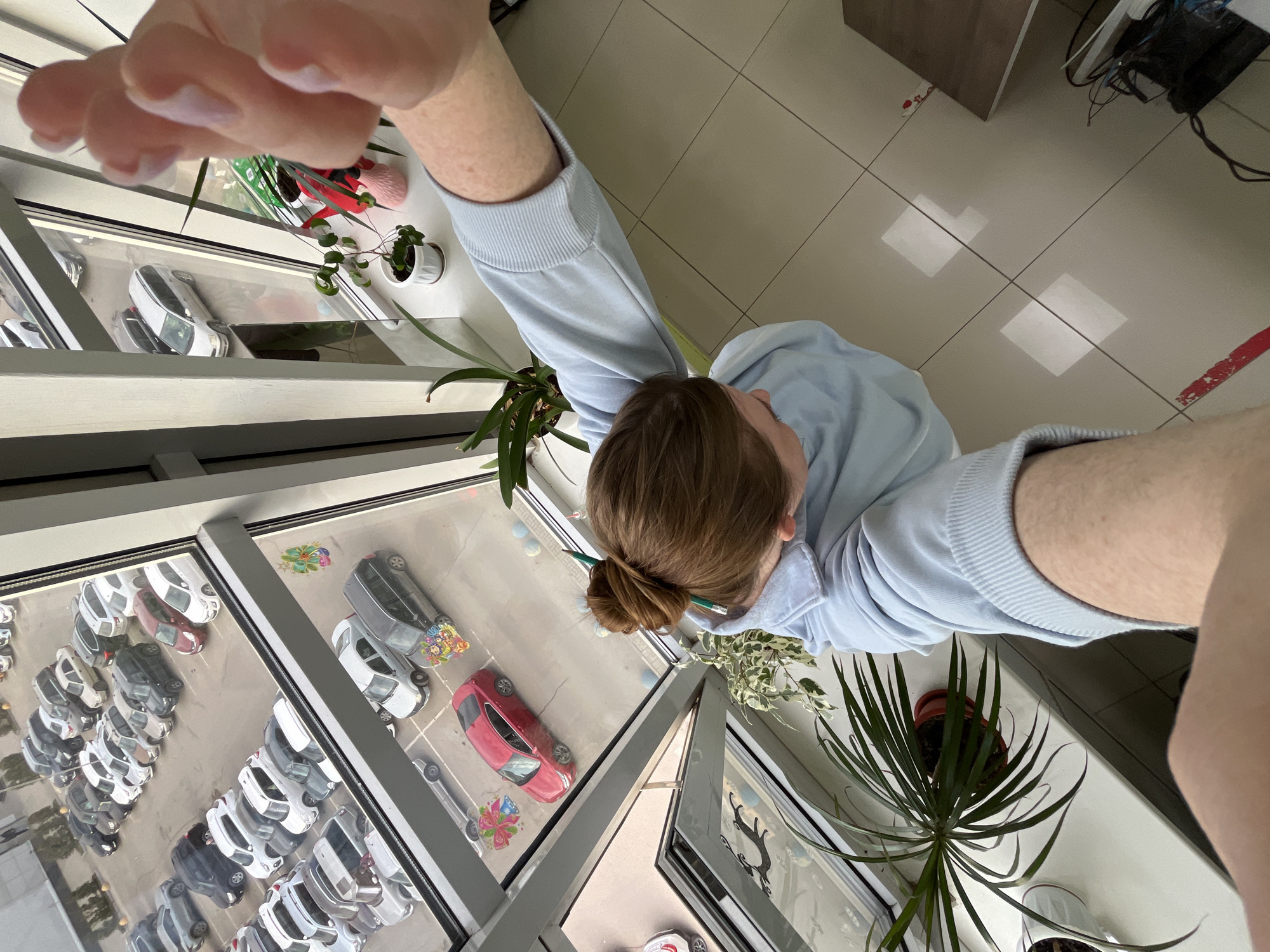Office worker performs desk calculations and paperwork in Russia