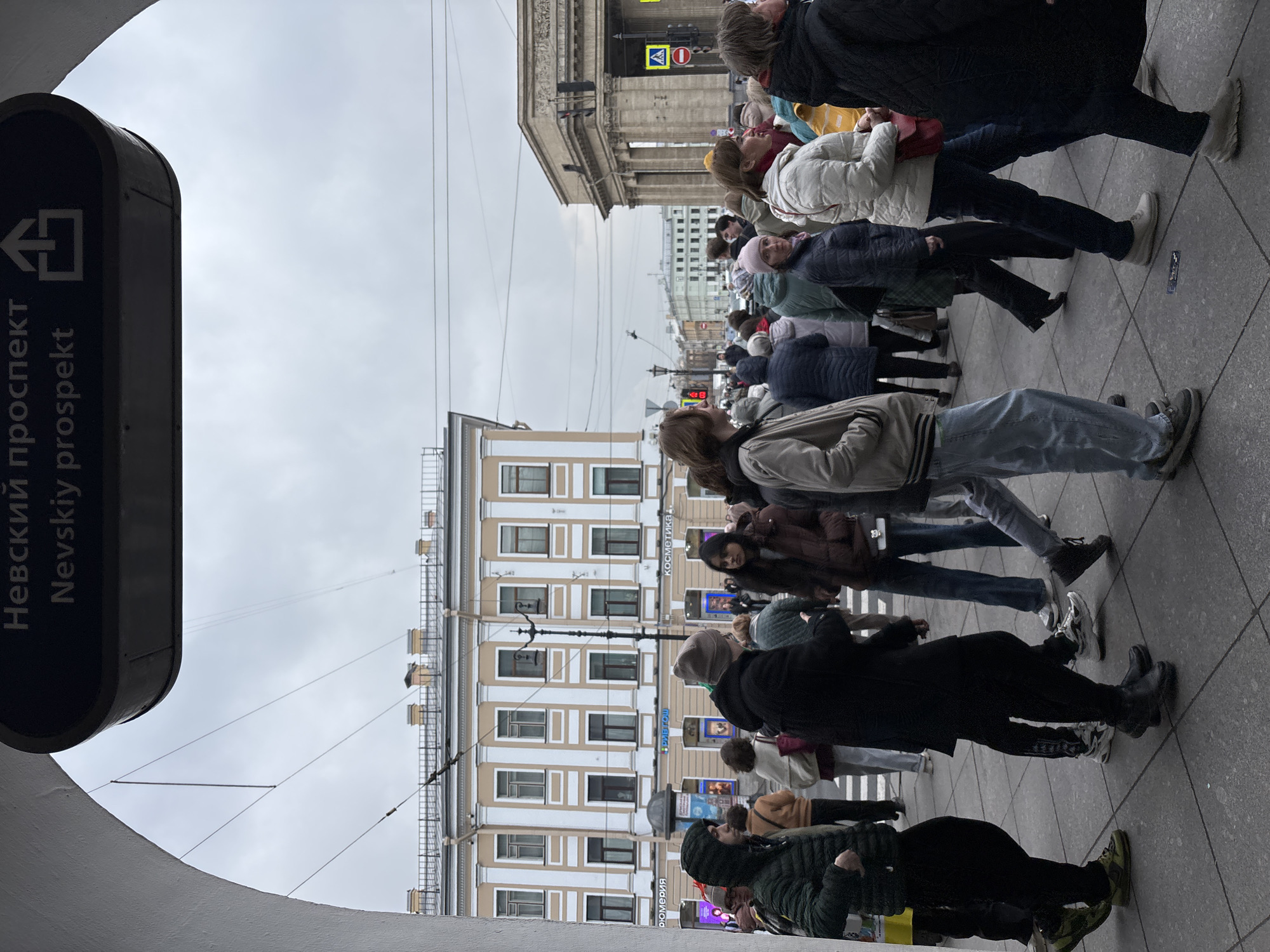 Pedestrians cross street on Nevsky Prospekt, Saint Petersburg