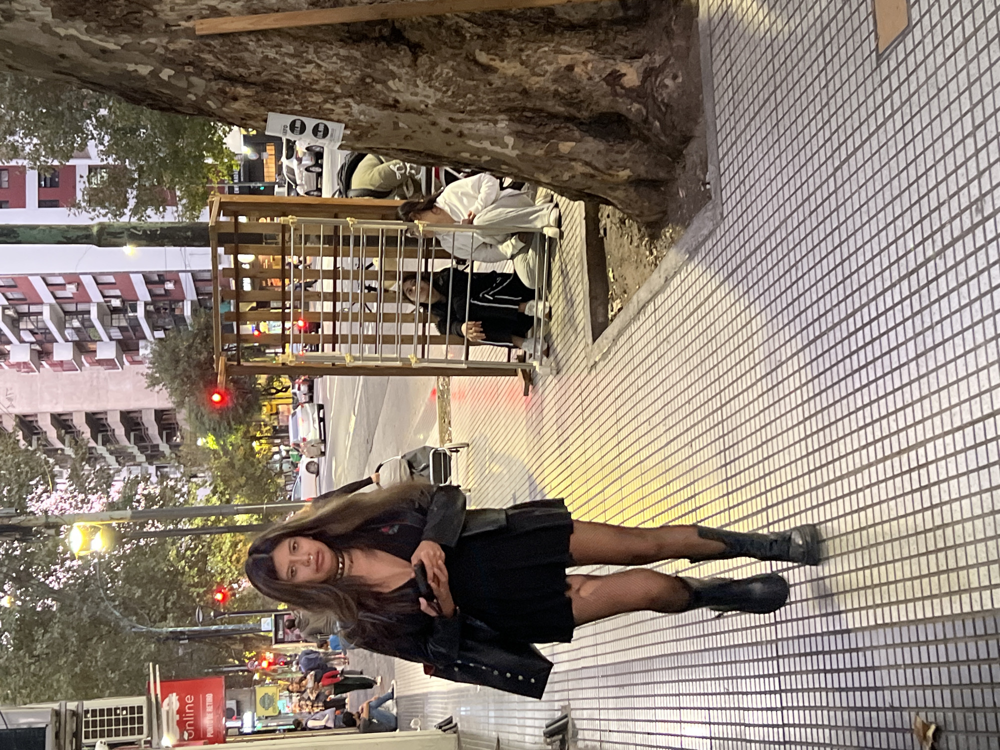 Evening street life documented across Buenos Aires neighborhood
