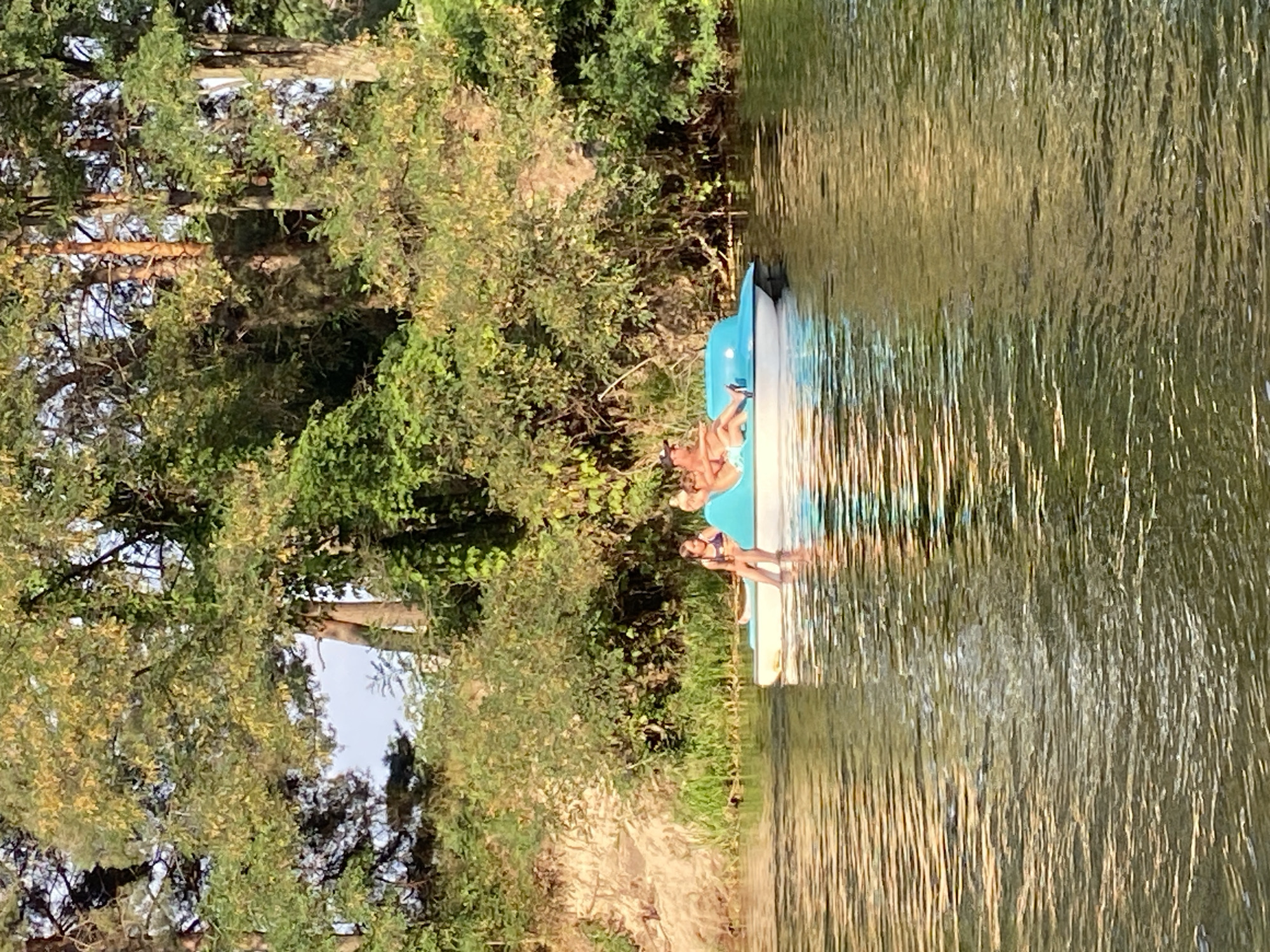 Afternoon on the river: paddleboards, pedal boats, and a tree jump