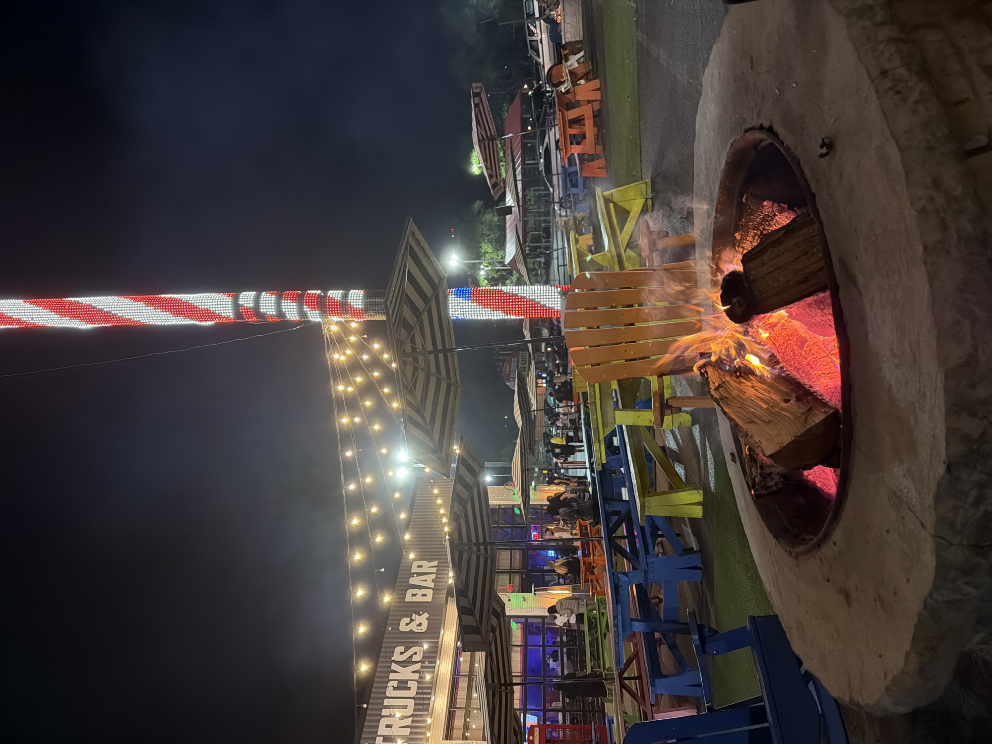 Nighttime food truck park scene captured in Wisconsin Dells