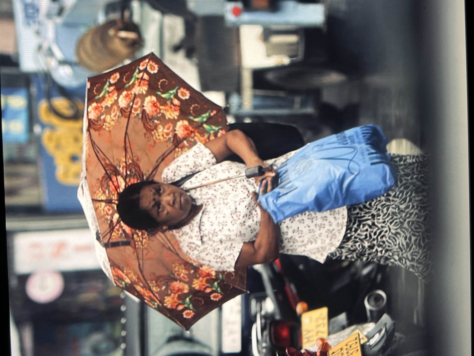 Market scenes with woman and fruit stall documented
