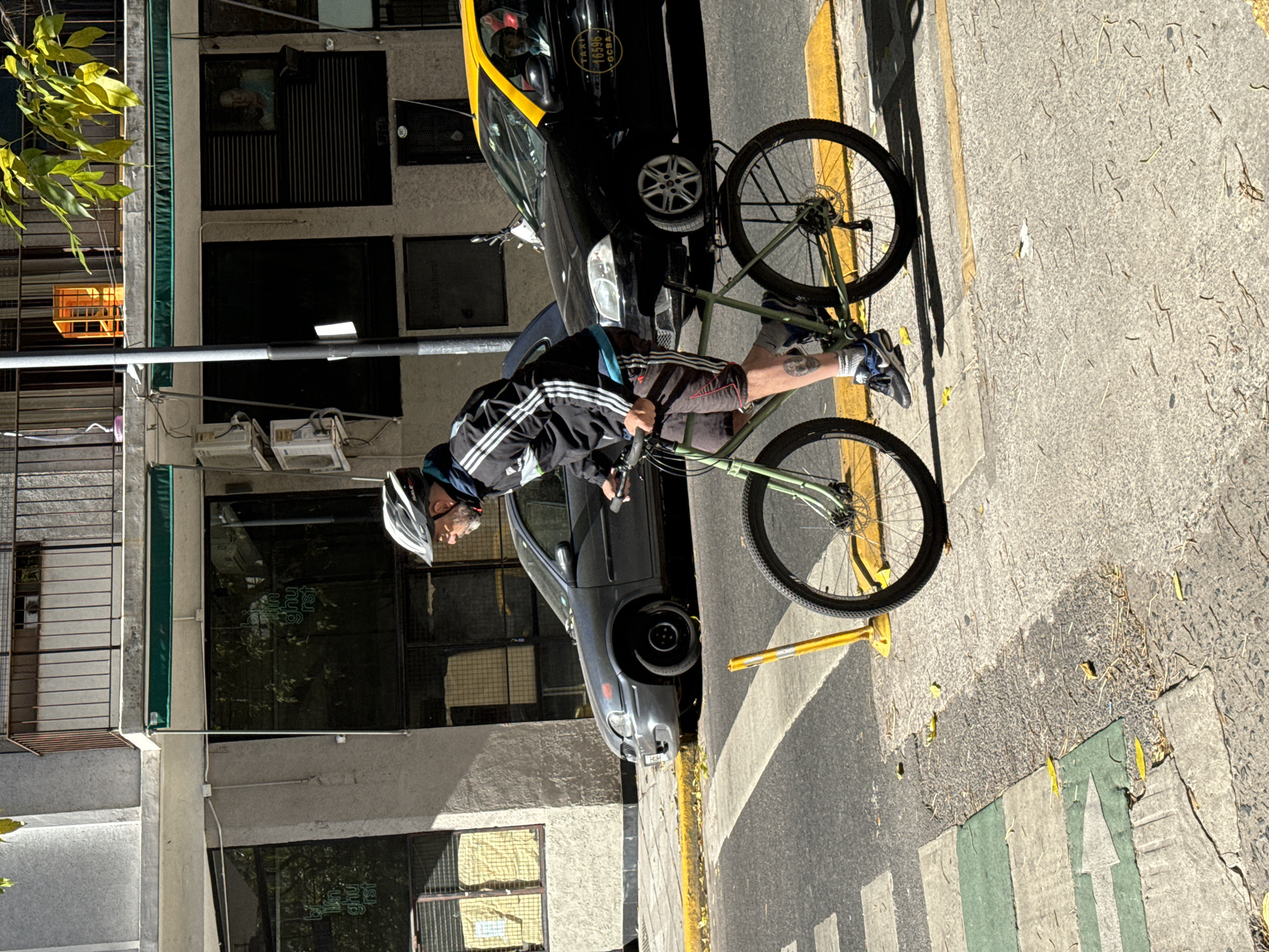 Buenos Aires street scenes include vehicle crash, cyclists, routine activity