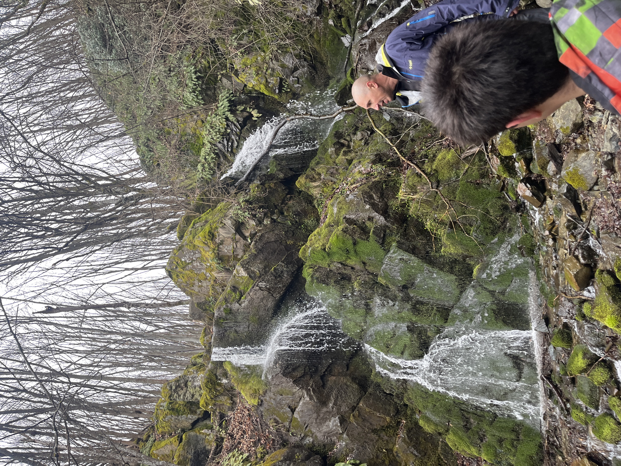 Man drinks from waterfall in Sofia Bulgaria