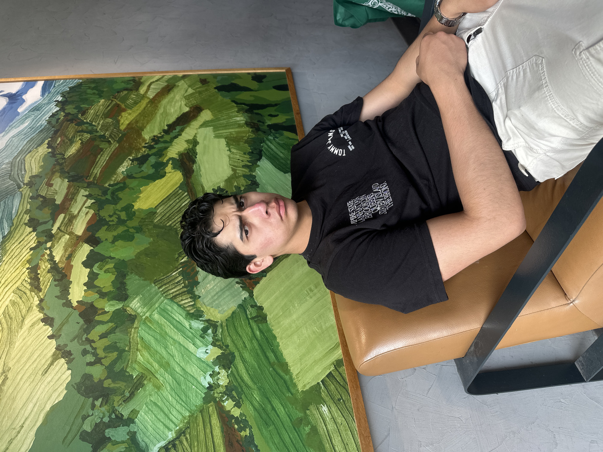 Young man spends evening at Starbucks in Puebla