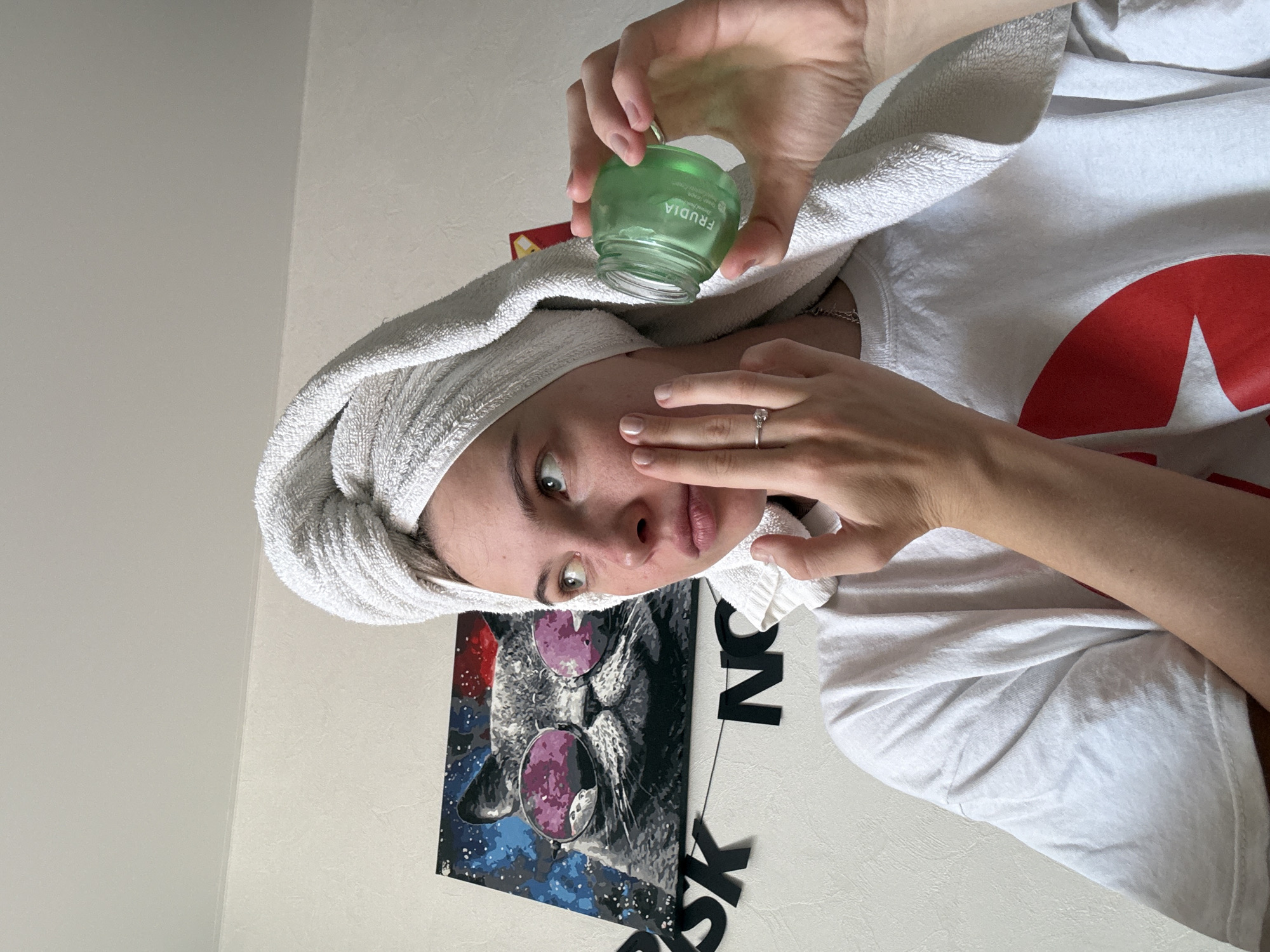 Woman's morning skincare routine documented in Perm, Russia