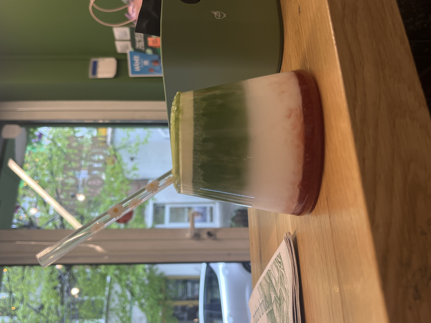 Layered green beverage documented in Sofia cafe