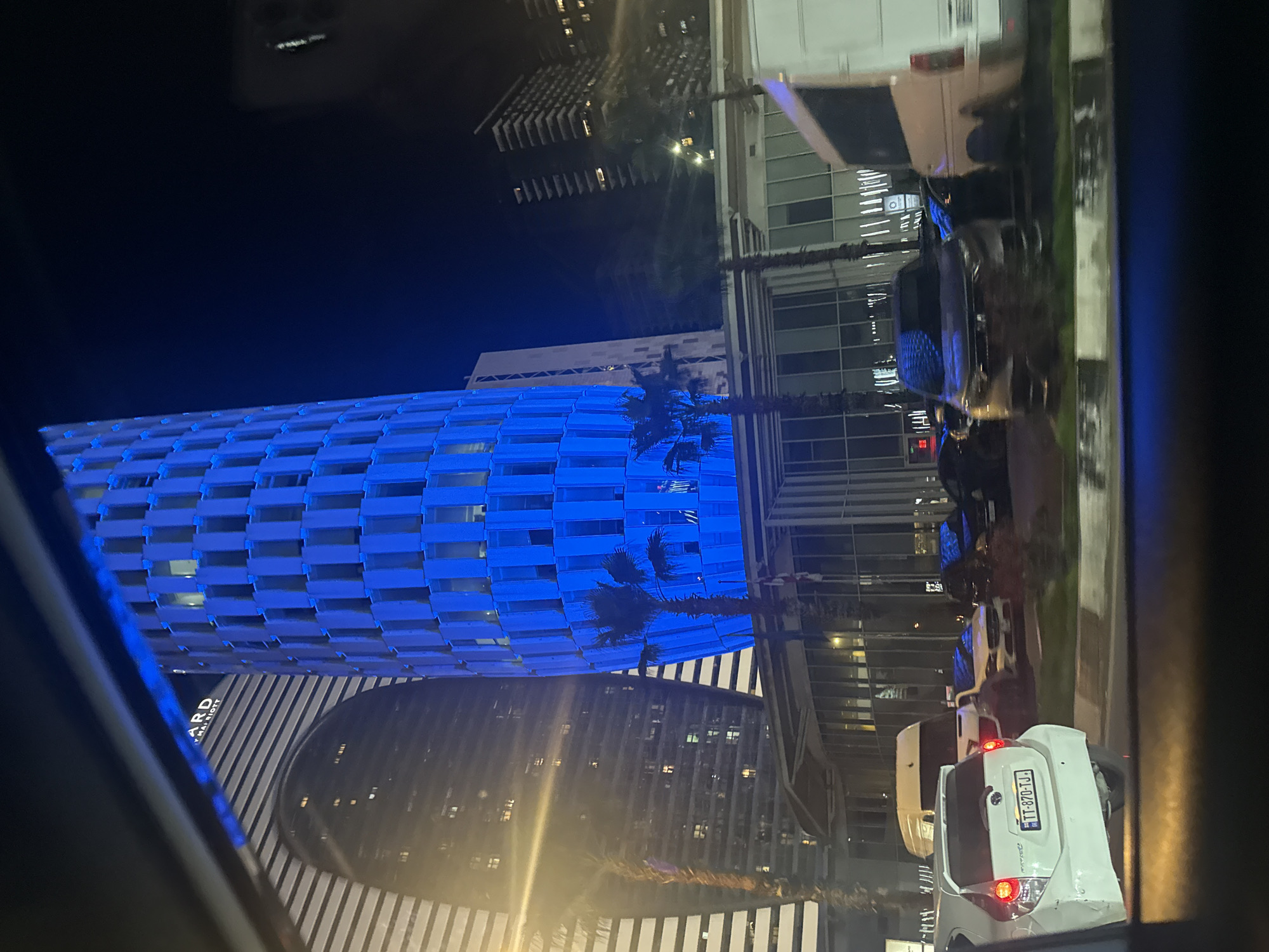 Nighttime urban skyline observed from vehicle in Batumi, Georgia