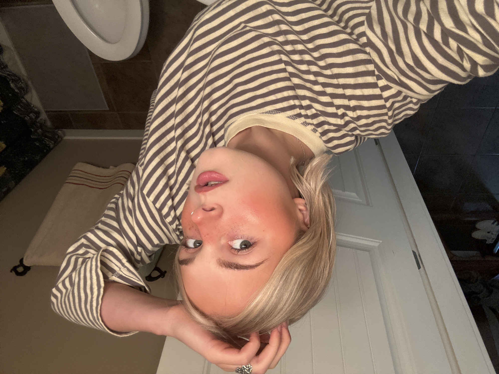 Woman takes selfies in Whistler bedroom
