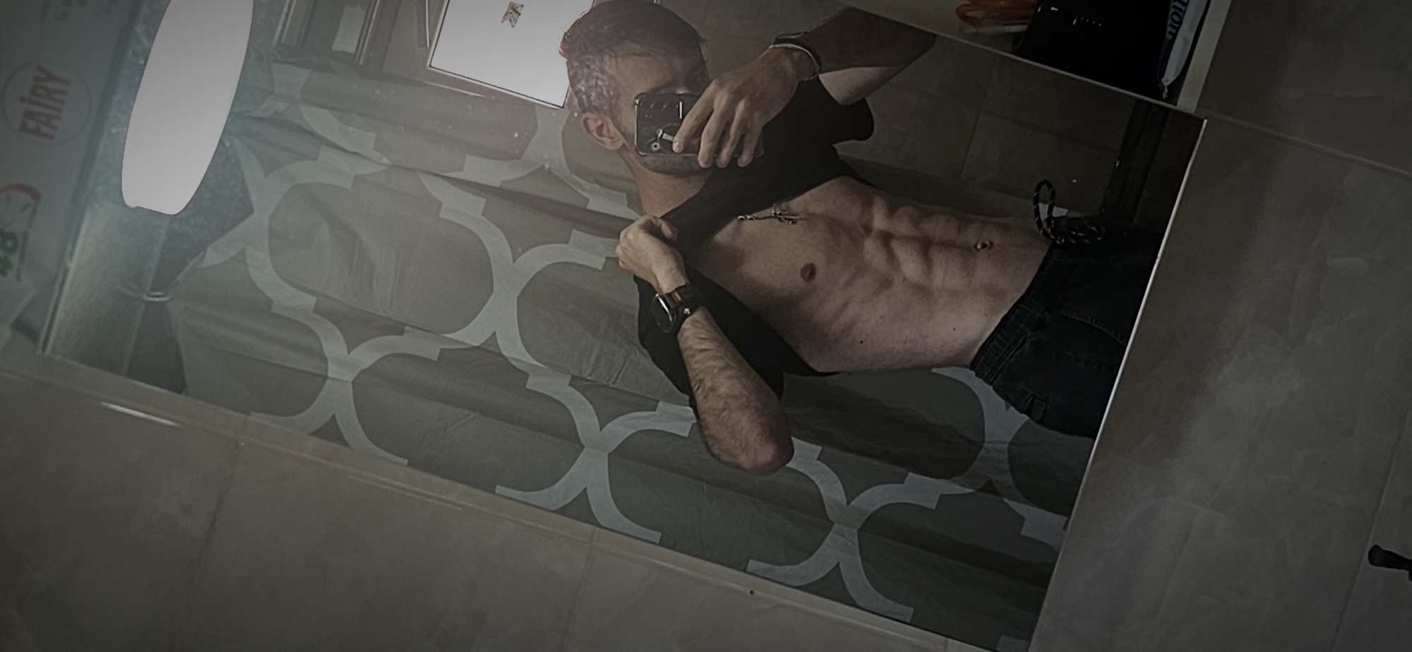 Man takes bathroom mirror selfies in Kostenets, Bulgaria