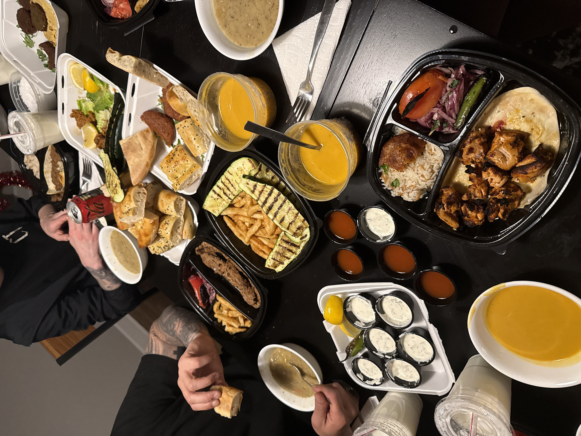 Middle Eastern feast spread documented on Chicago table