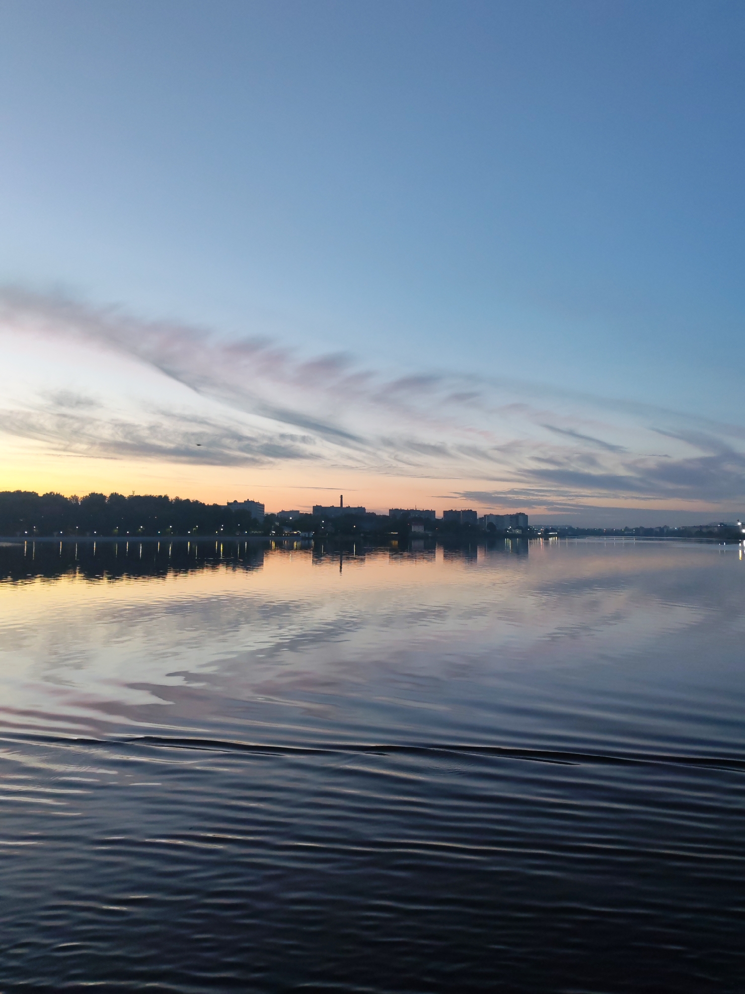 Peaceful dusk scenes captured along Sheksna River in Cherepovets