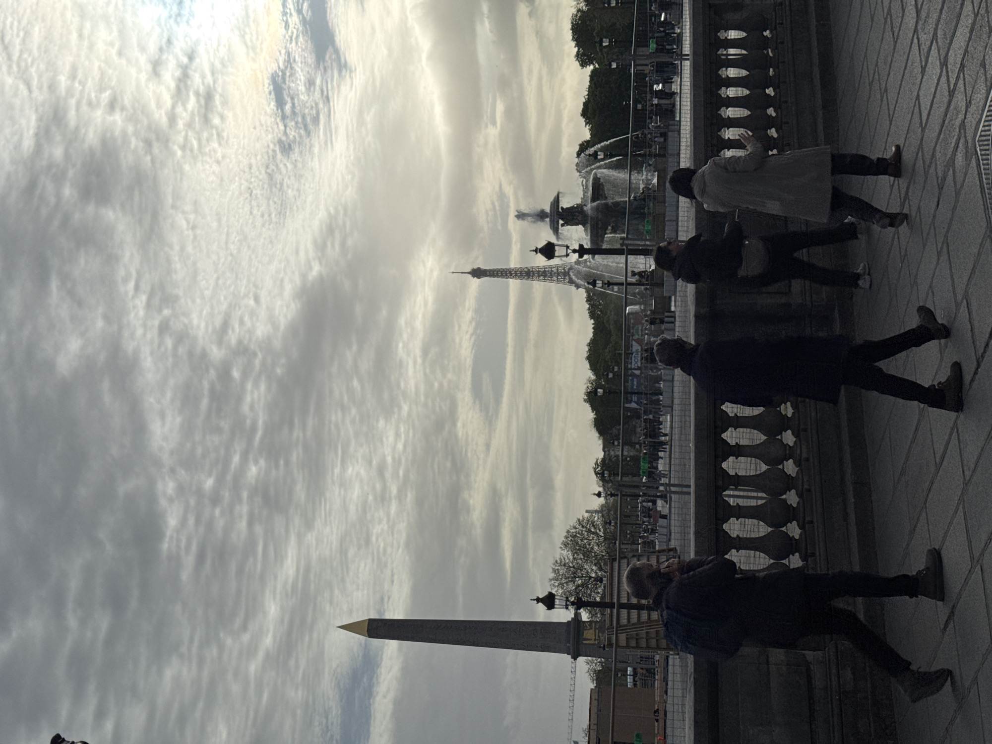 Tourist captures classic Paris vista at Place de la Concorde