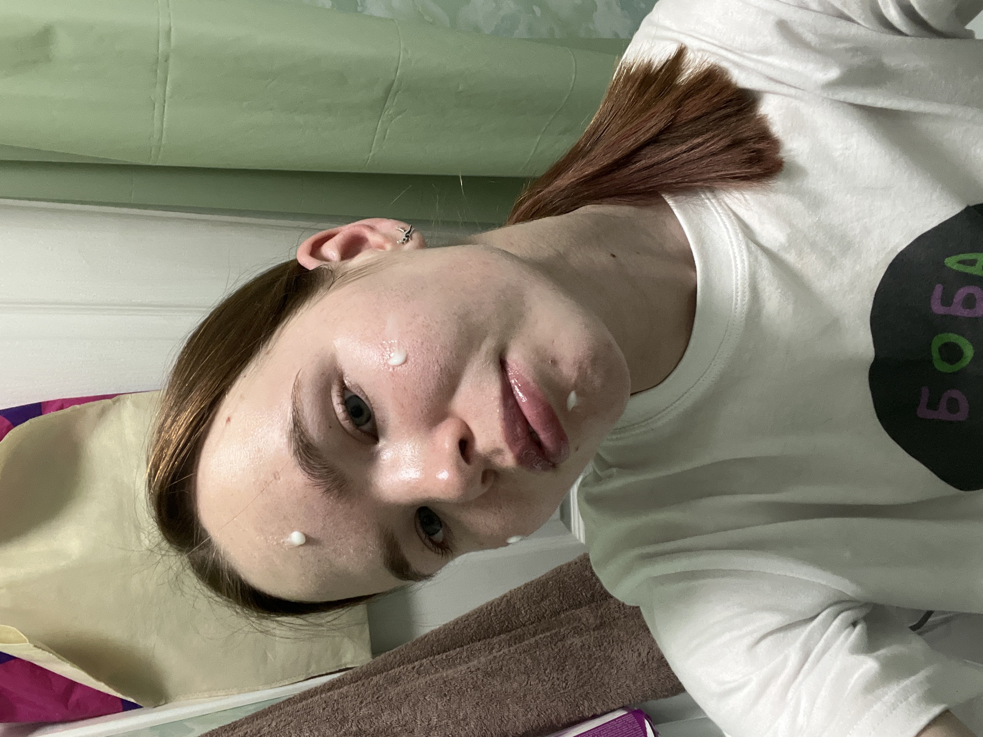 Woman documents evening skincare routine in Chaikovsky bathroom selfies