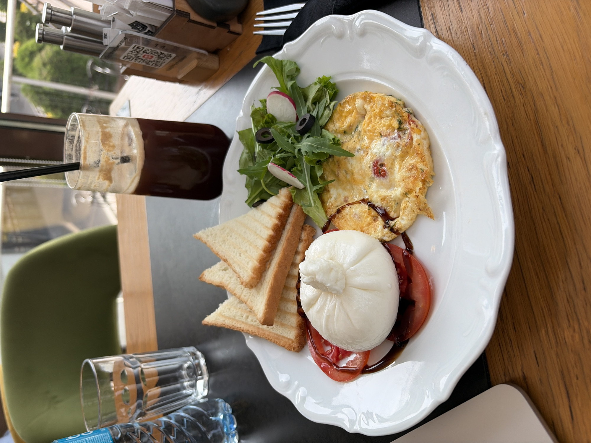 Breakfast with burrata served at Almaty café