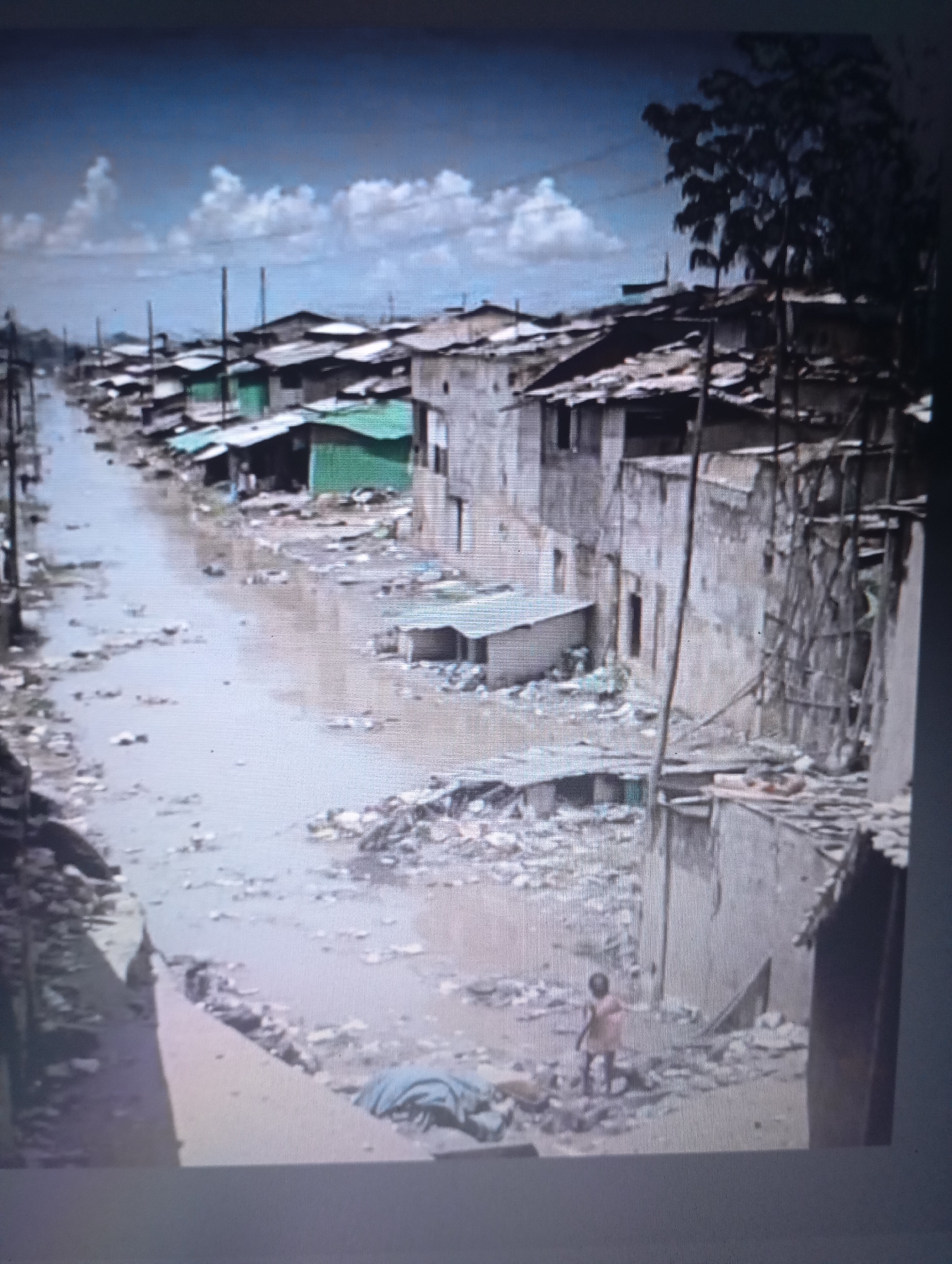 Mixed visual documentation captures flood scene and cultural artifacts